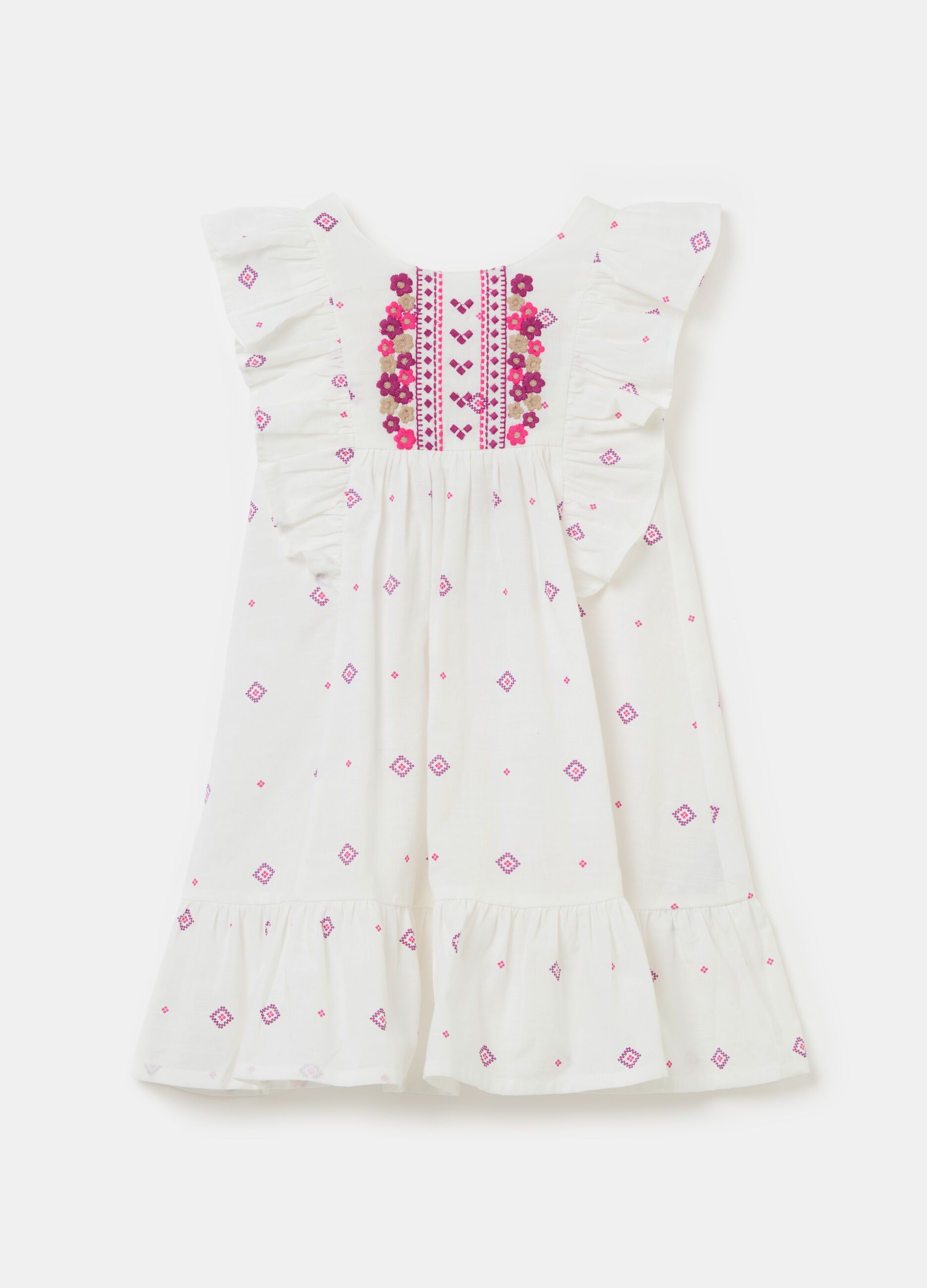 Embroidered dress with flounce