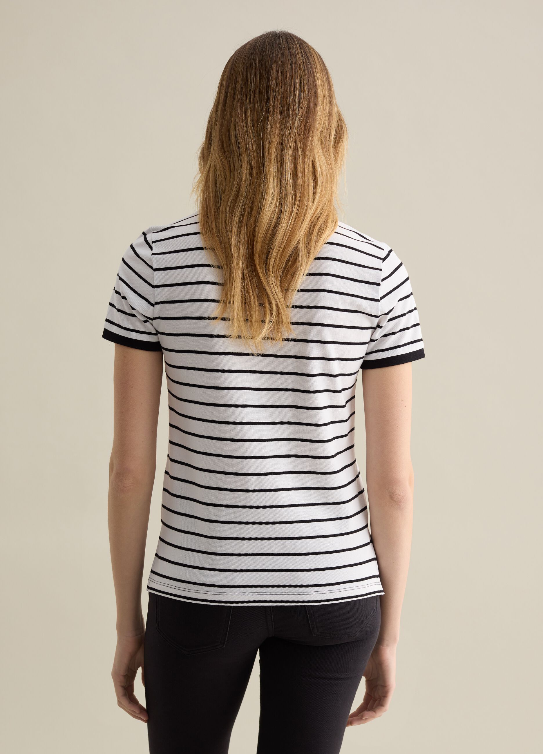 Black and white striped polo shirt in piquet