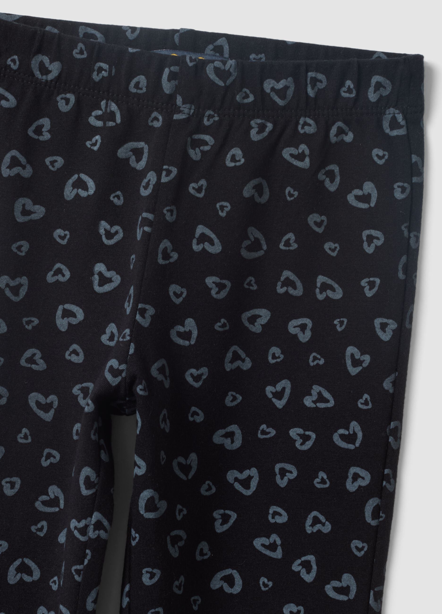 Black skinny organic cotton leggings with heart print for girls