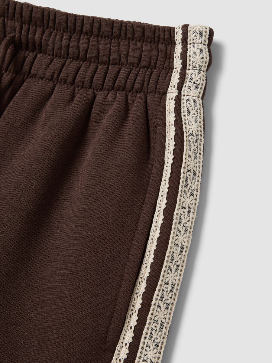 Brown cotton-blend wide-leg trousers with lace detailing_1