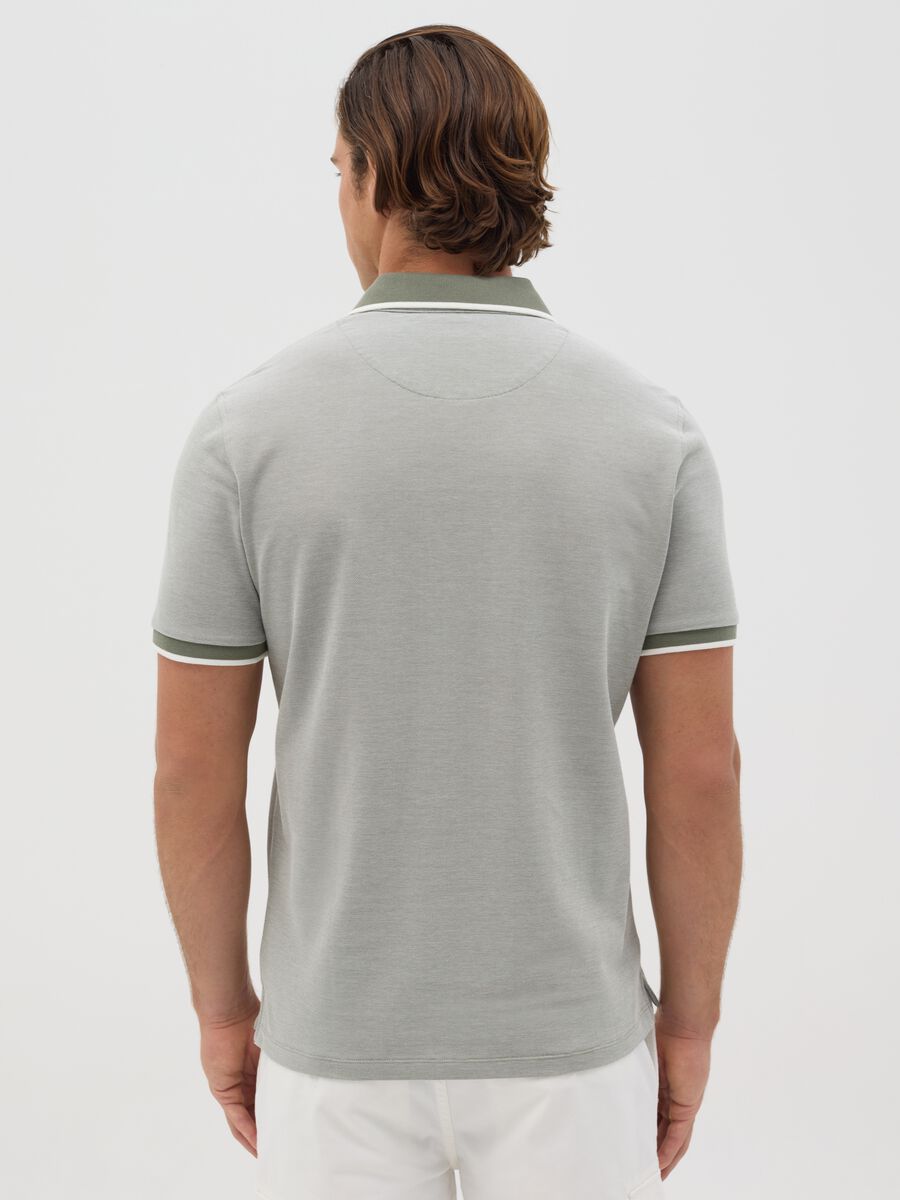 Green polo shirt with short sleeves in cotton piquet_2