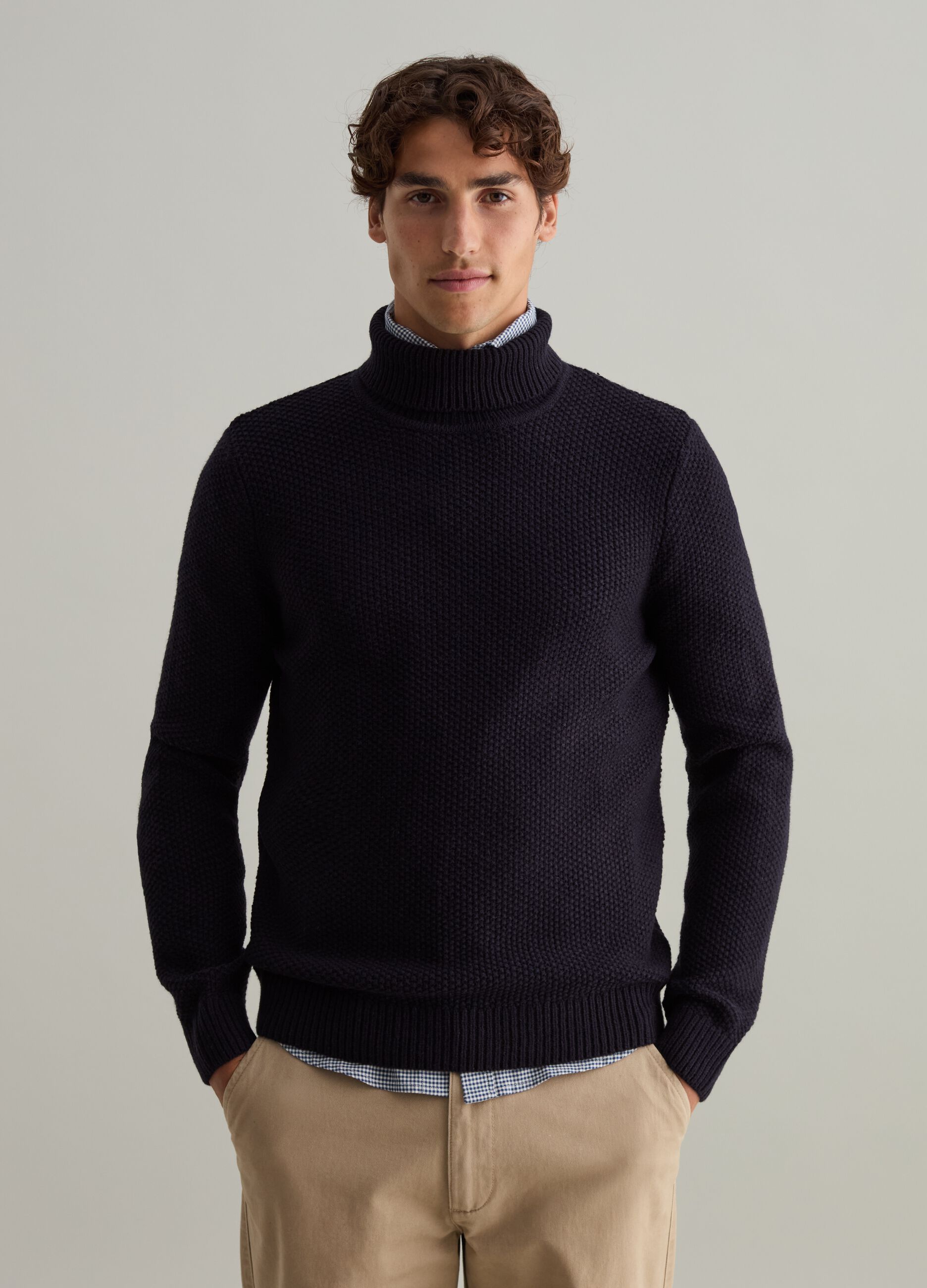Knitted pullover with high neck