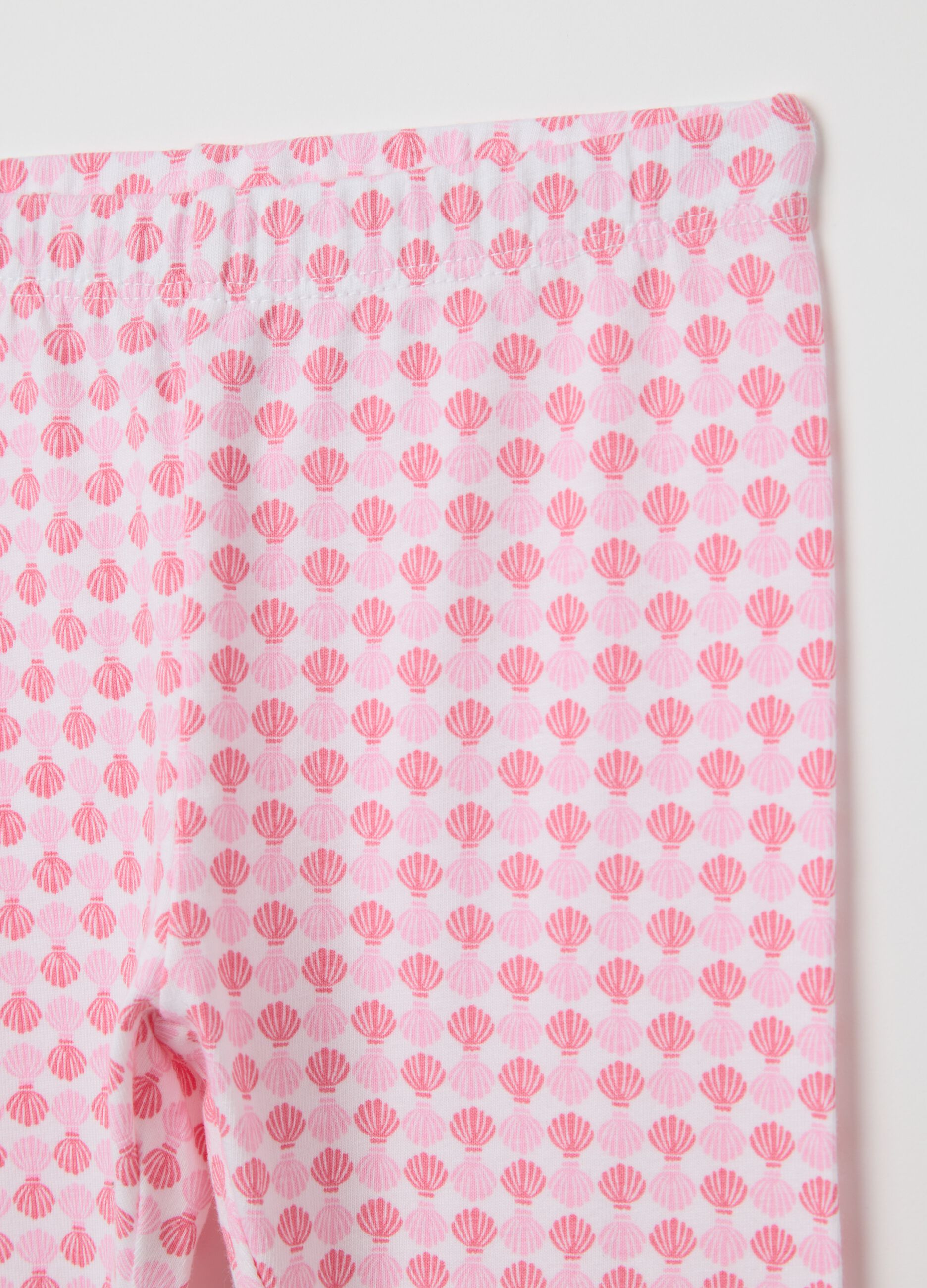 White and pink three-quarter stretch leggings with print