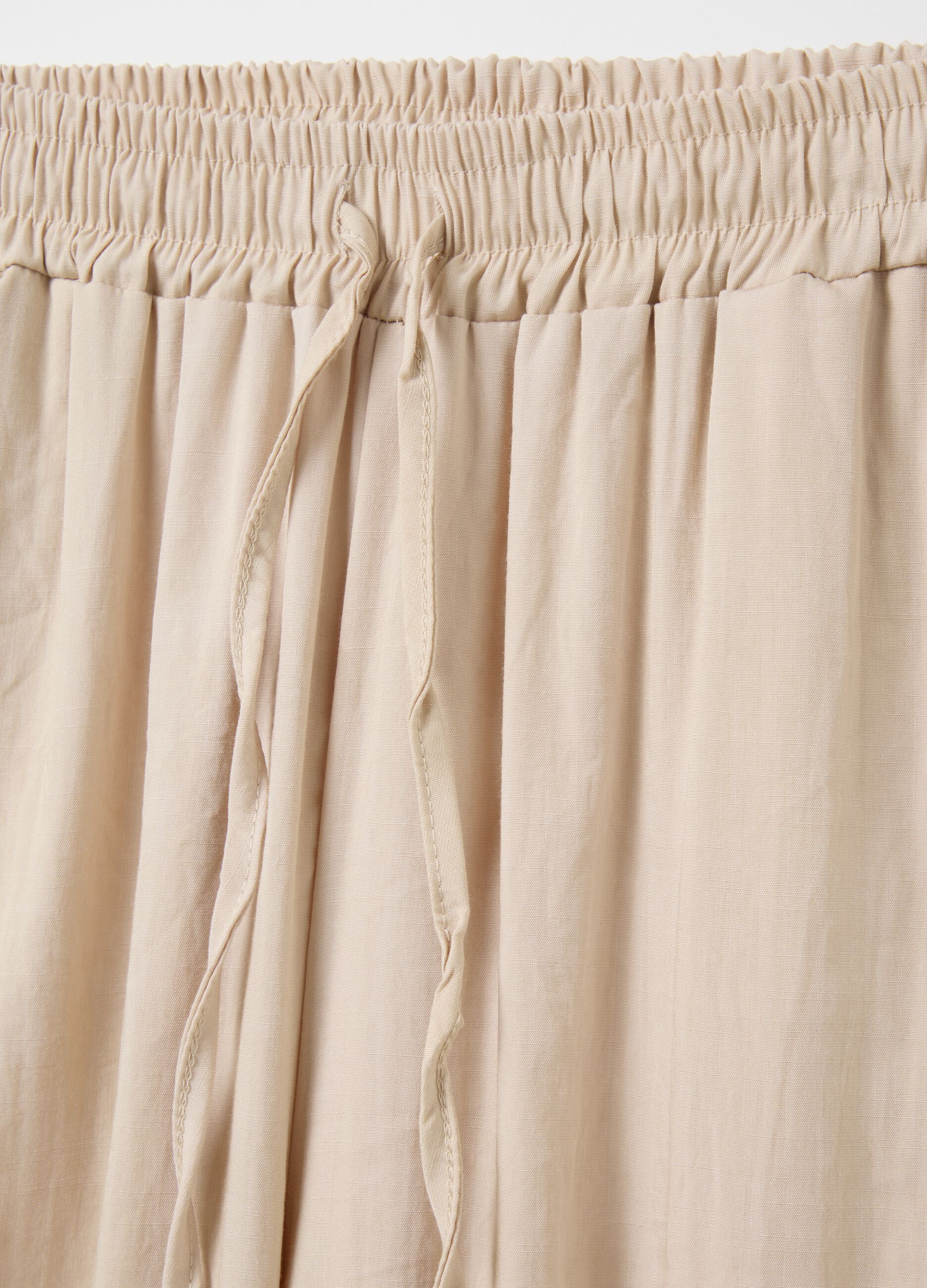 Beige wide-leg trousers