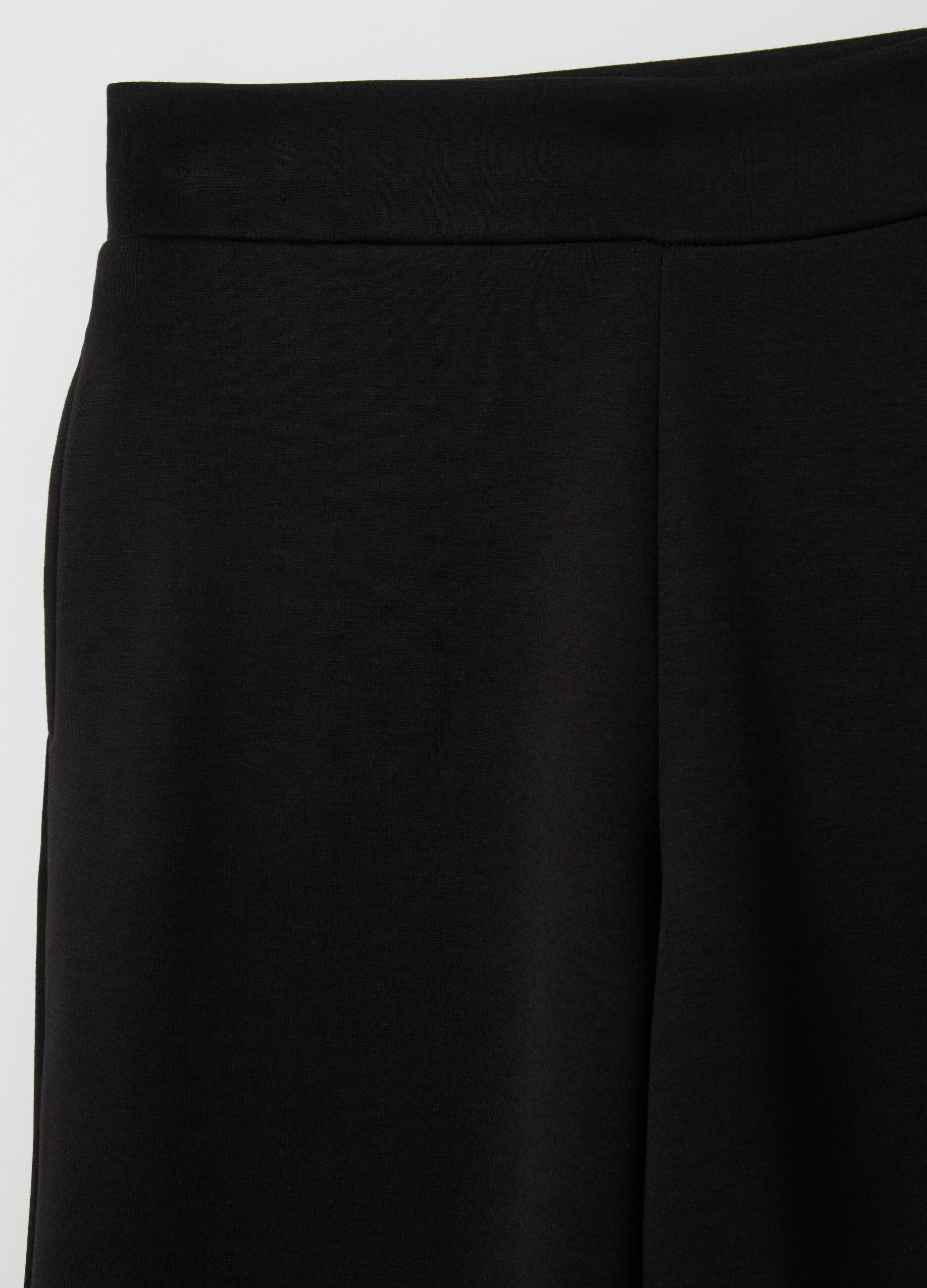 Solid colour wide-leg trousers