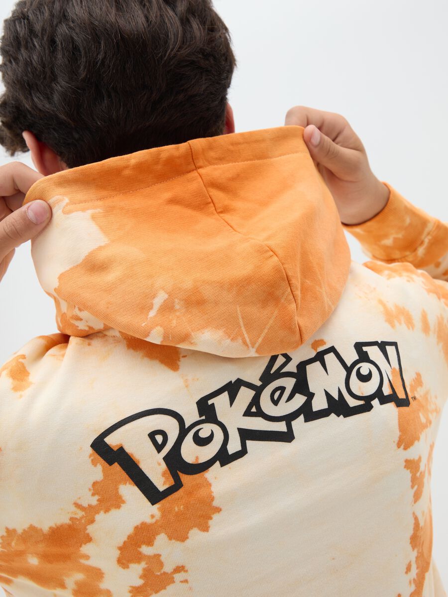 Orange tie-dye sweatshirt with hood and Charizard print_1