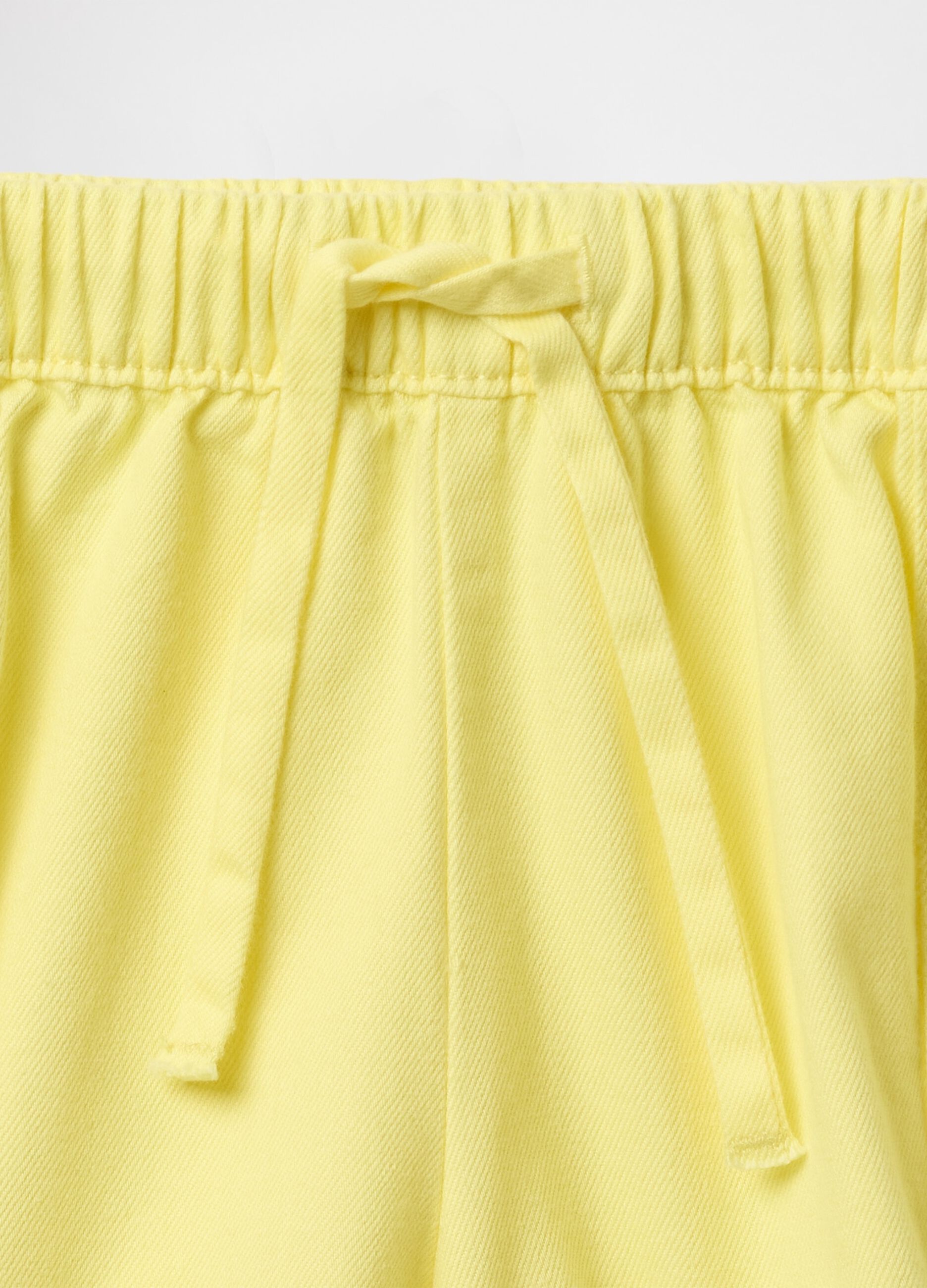 Yellow shorts with drawstring
