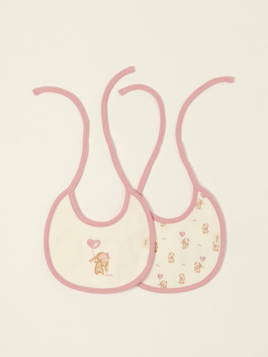 Two-pack of white pure cotton baby girl bibs with cute prints_0