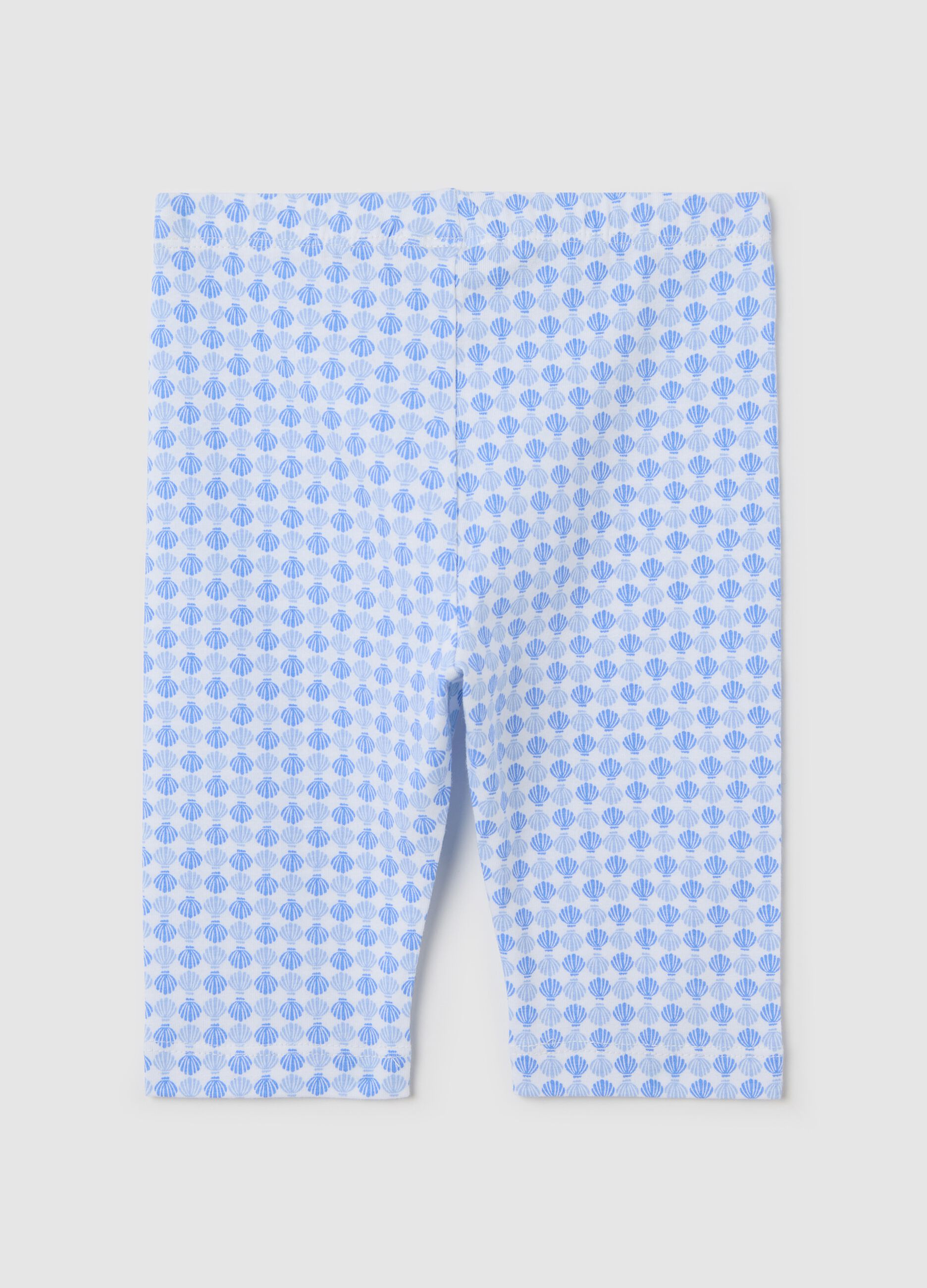 White and light blue three-quarter stretch leggings with print