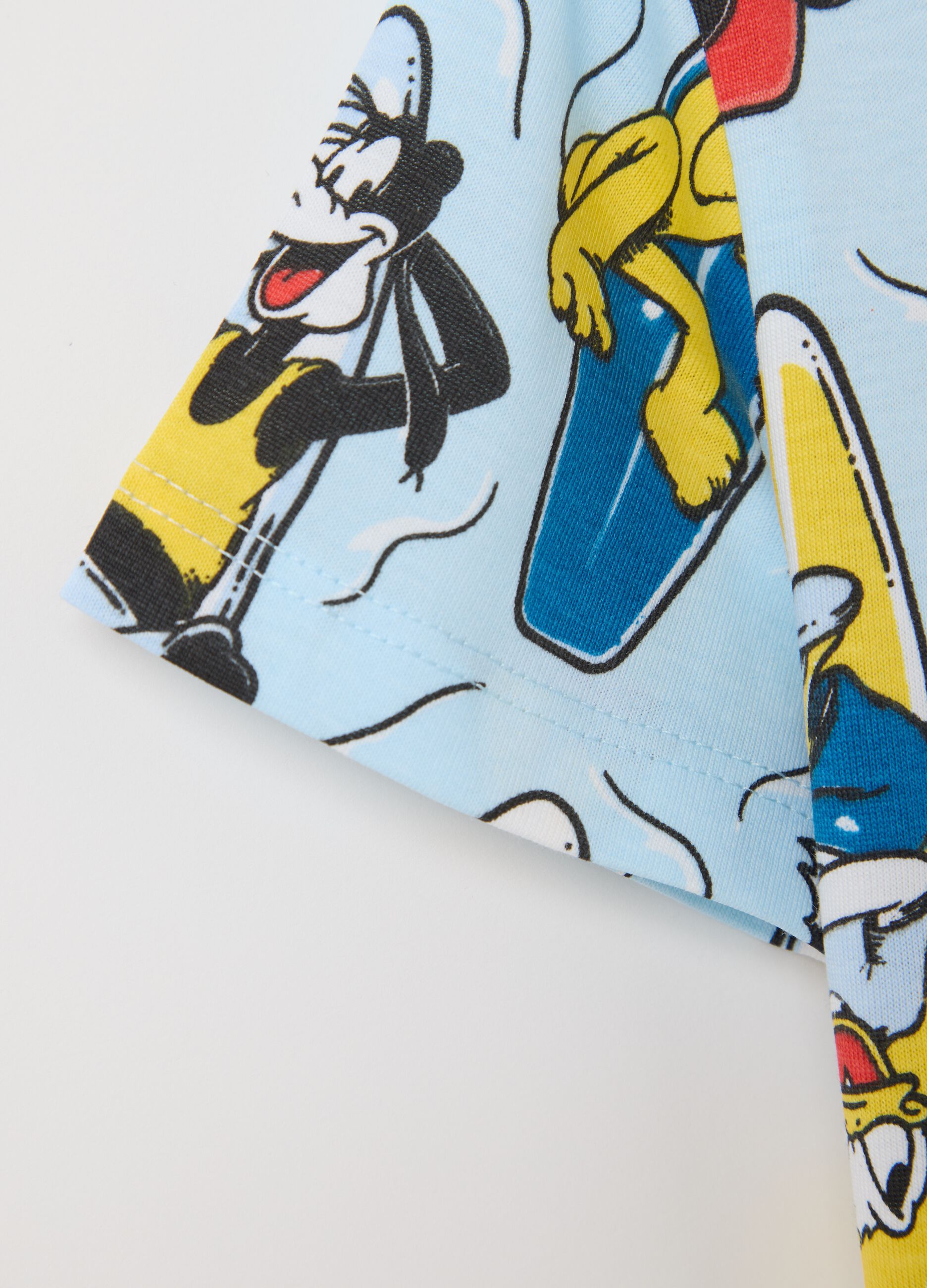 Sky blue T-shirt with short sleeves and Disney characters