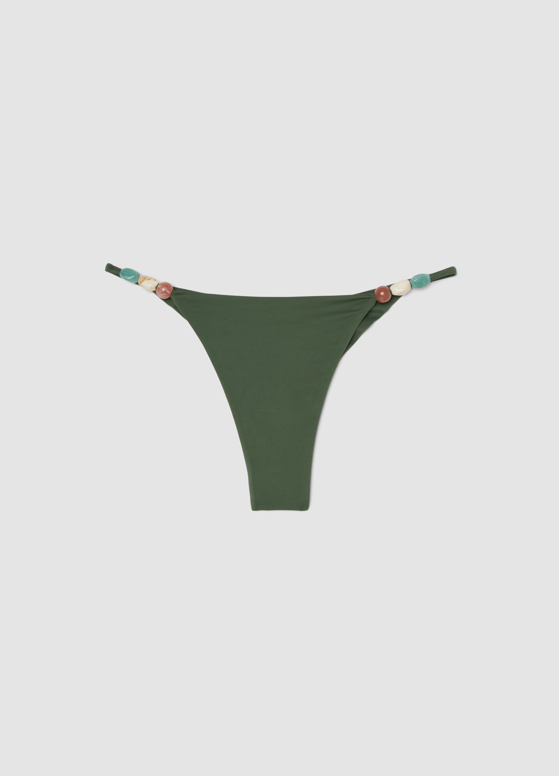 Green Brazilian-style stretch bikini bottoms with side stones
