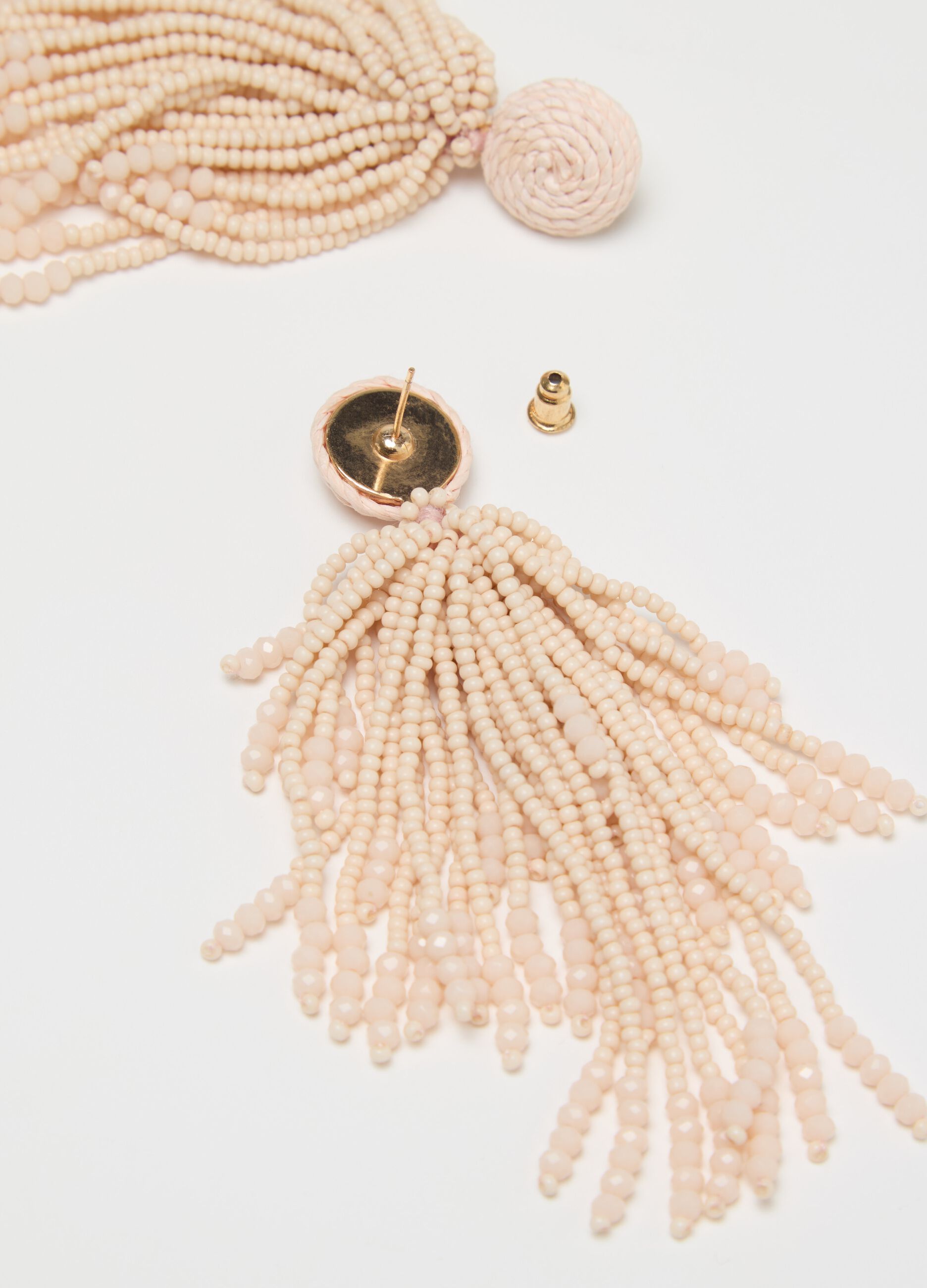 Earrings with pendants and beads