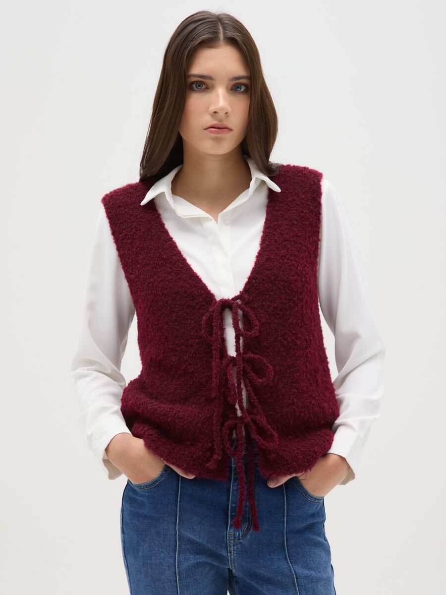 Red regular fit vest with lace closures_0