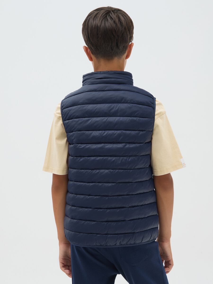 Boy's blue gilet with high collar_1