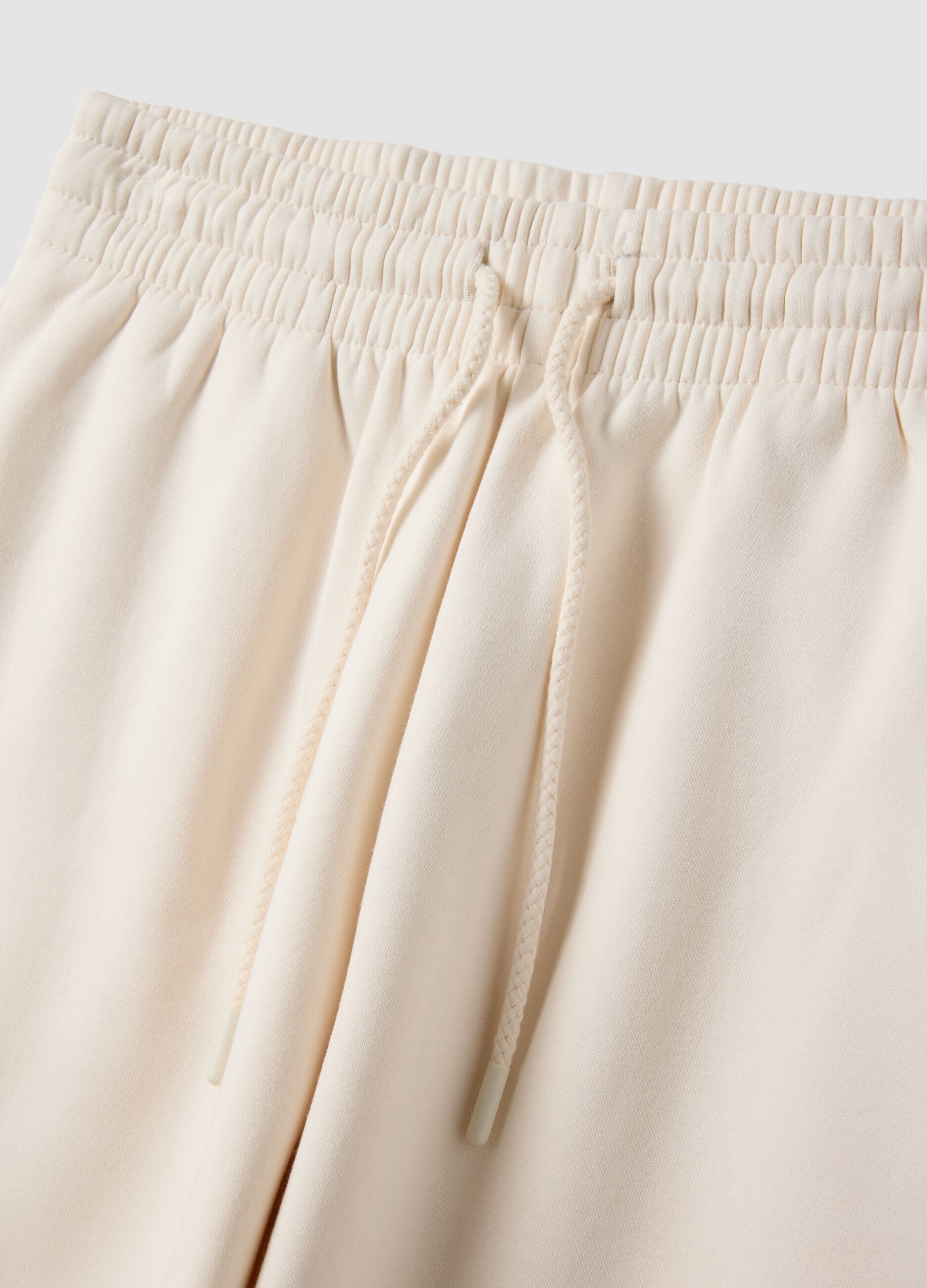 White cotton-blend jogger trousers with elasticated waist, regular fit