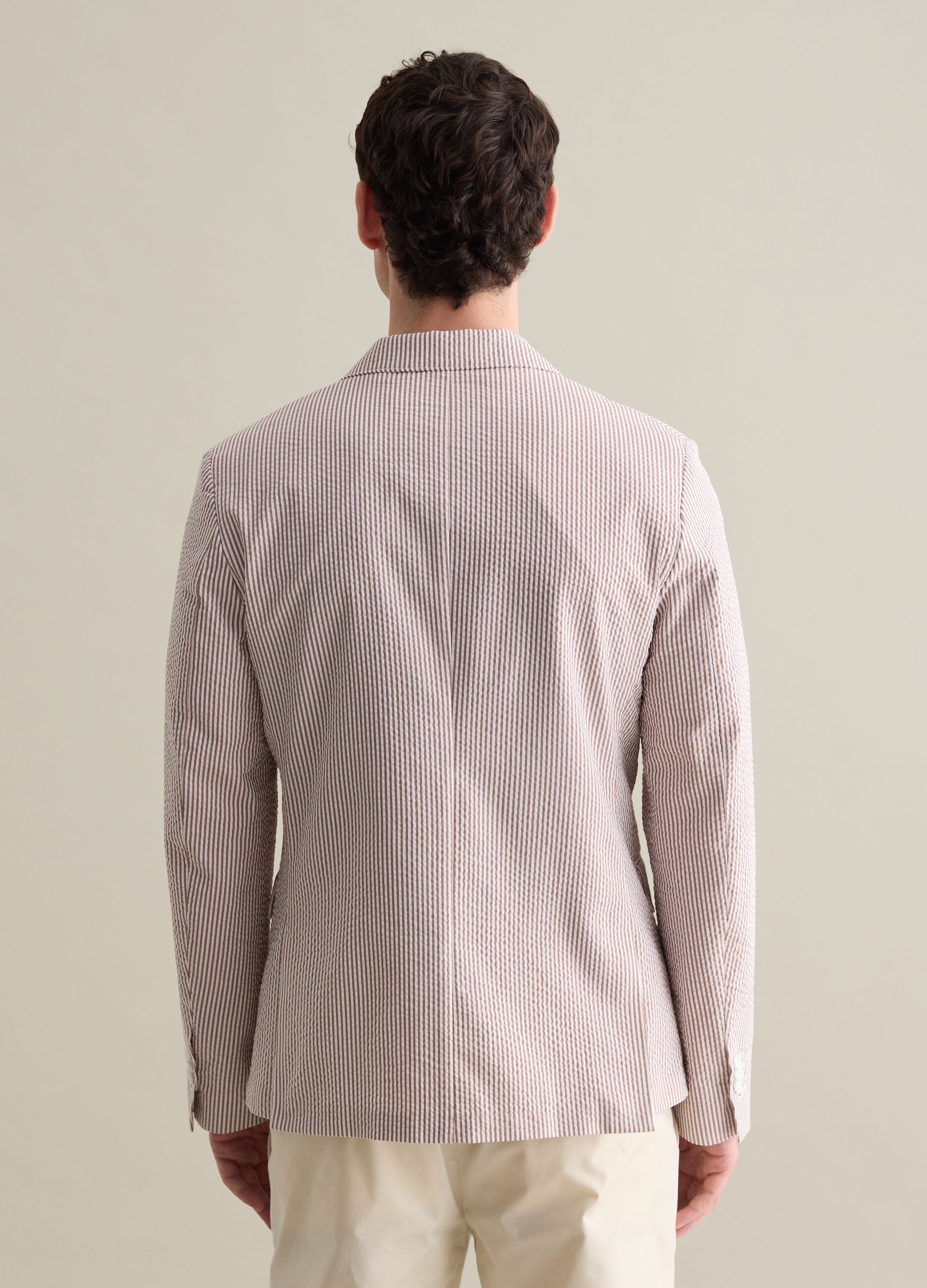 White and brown slim-fit blazer in striped seersucker