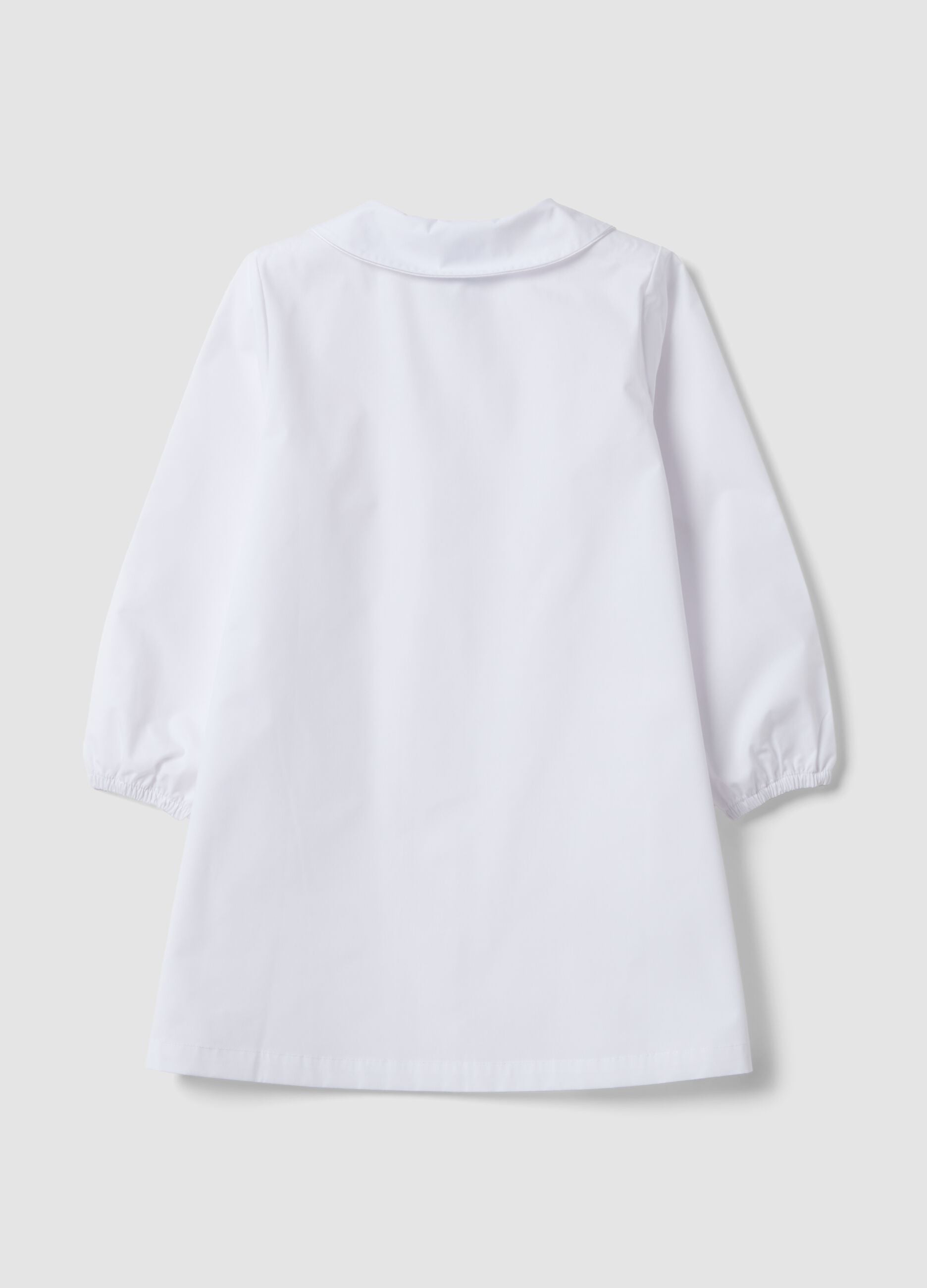White nursery apron with Frozen embroidery