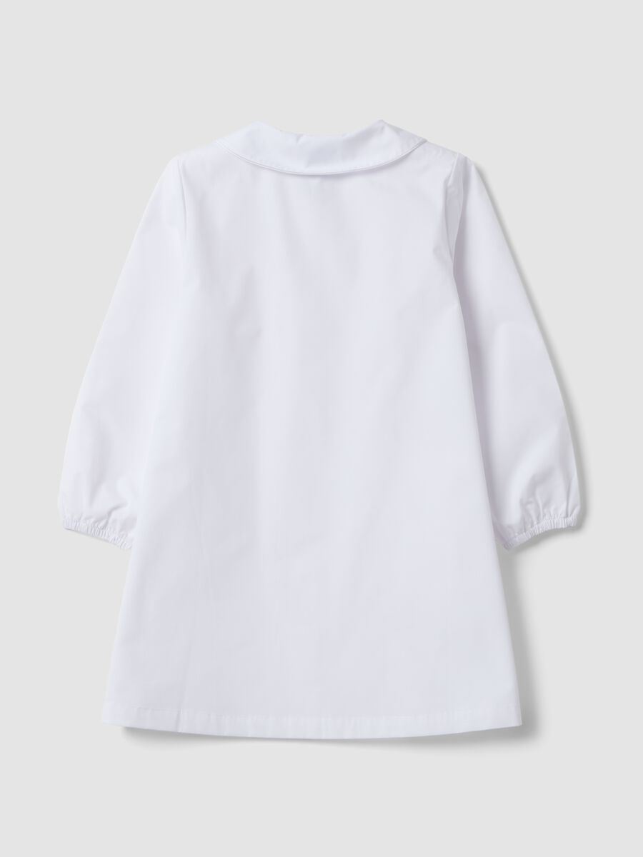 White nursery apron with Frozen embroidery_1