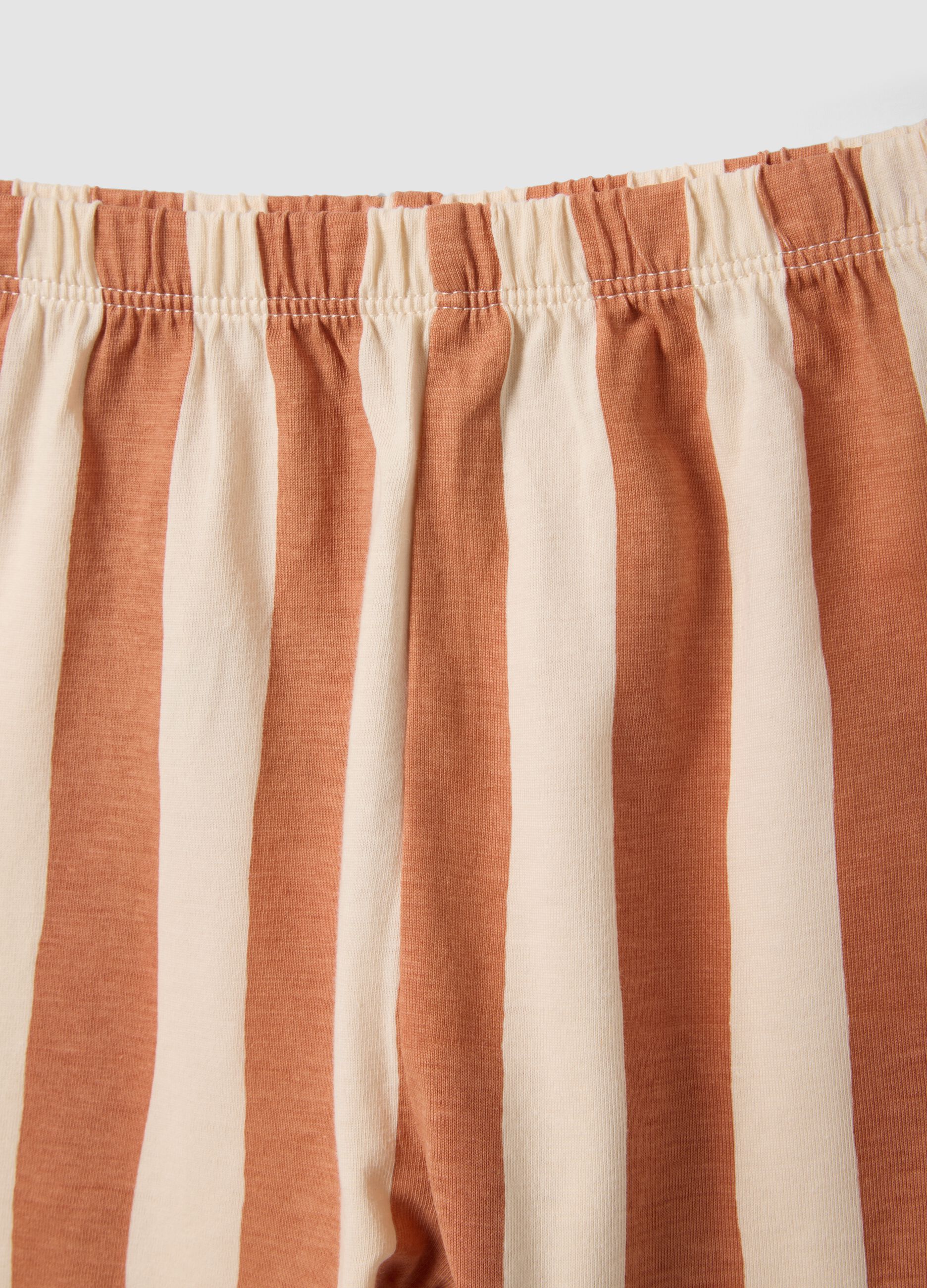 Beige organic cotton baby pyjama set with vest top and shorts