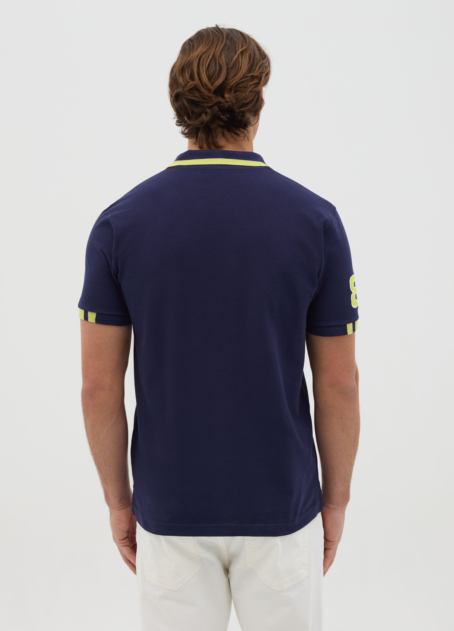 Blue polo shirt in cotton with Navy Sport patch