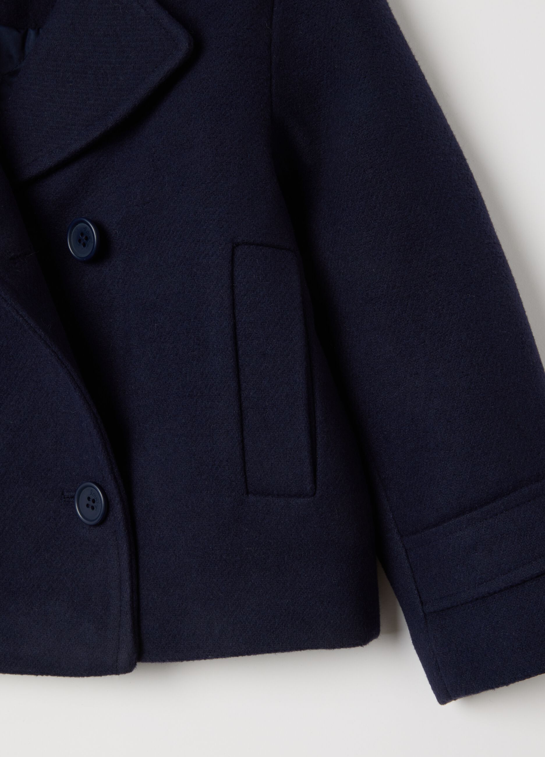 Girl's blue double-breasted coat with buttons