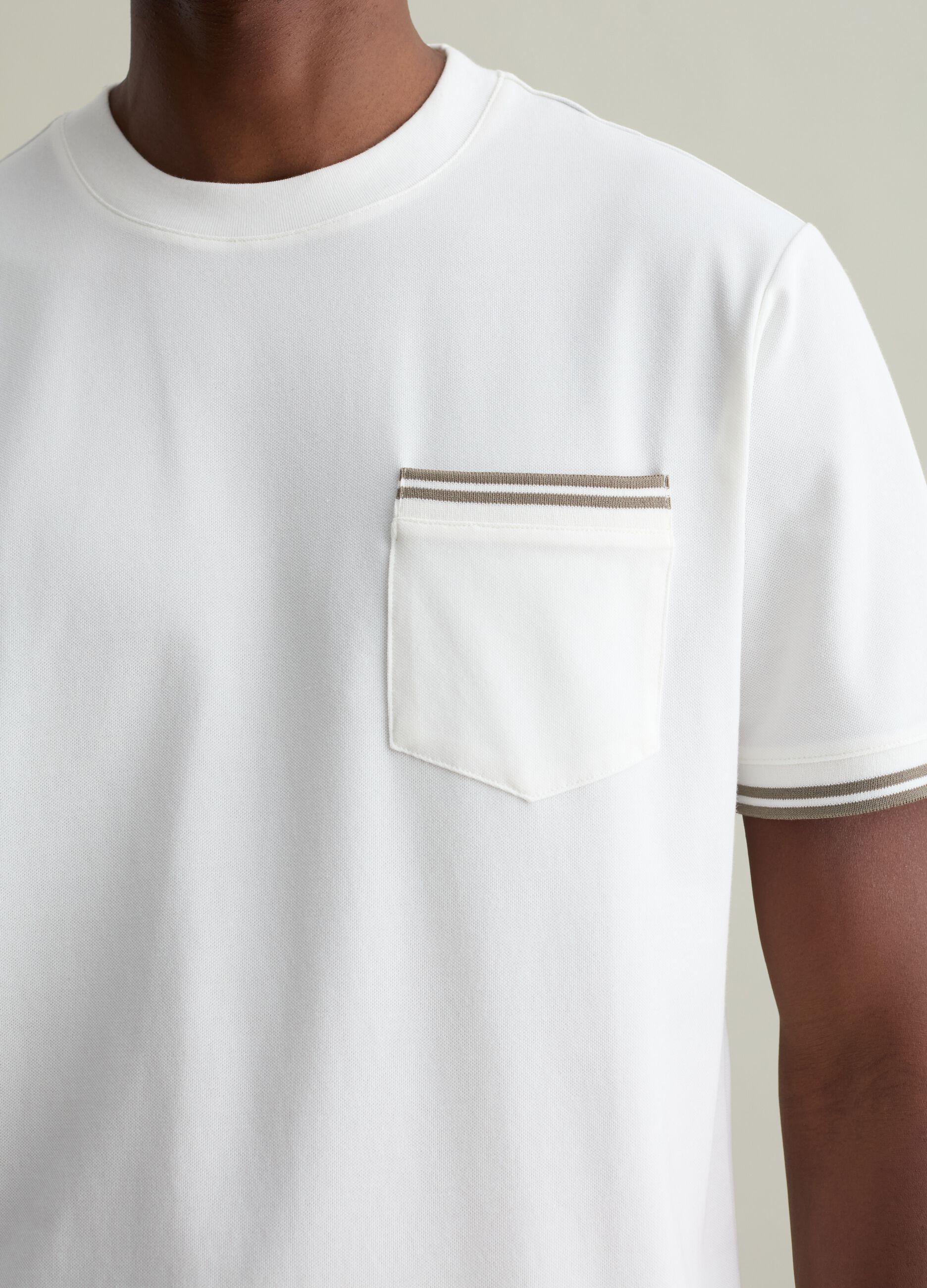 T-shirt with striped details and pocket