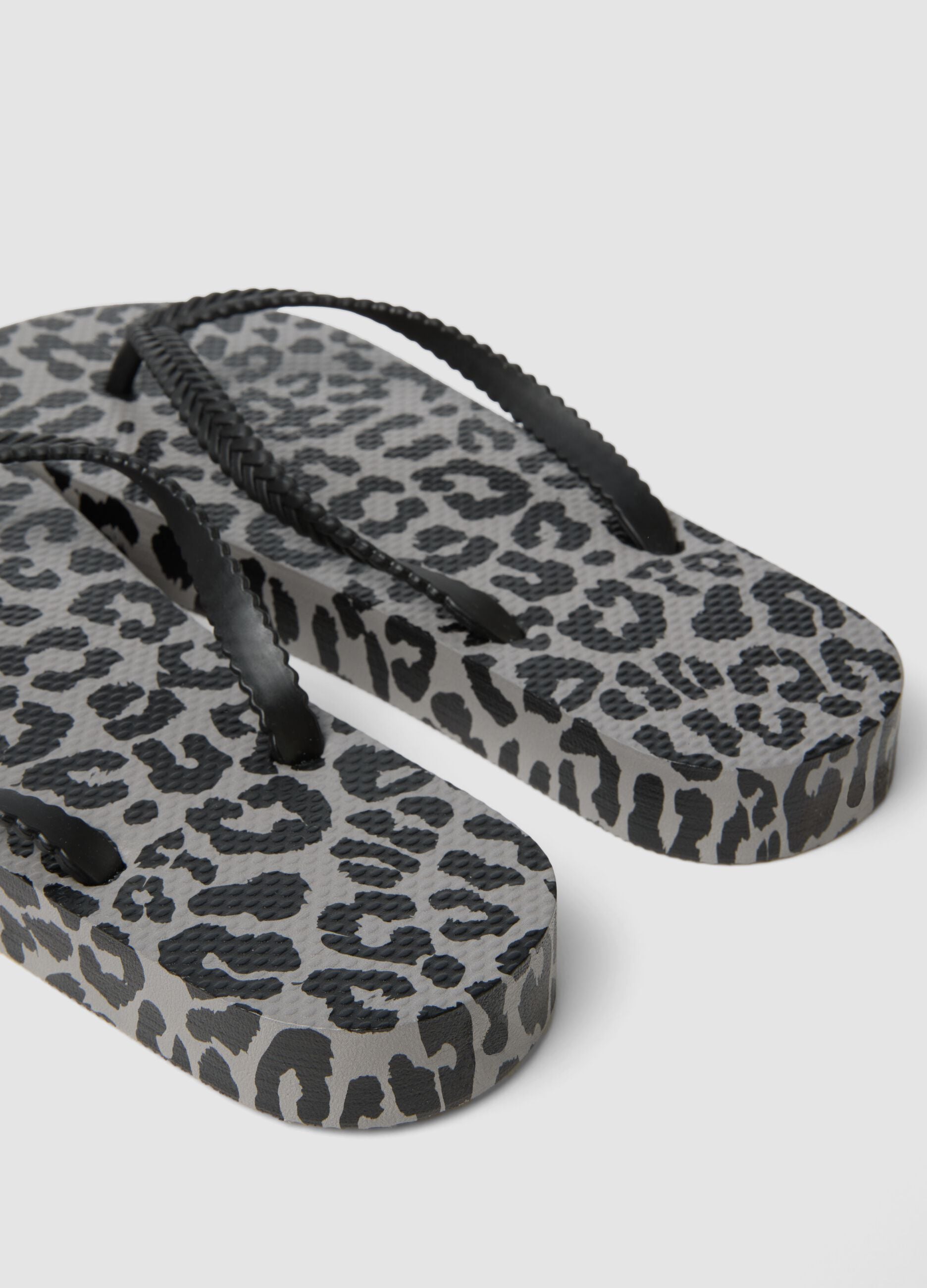 Multicoloured animal print flip-flops
