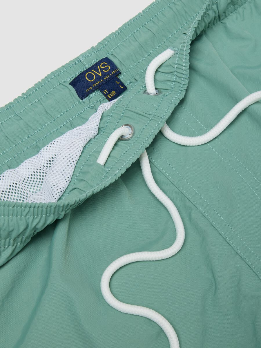 Green swim shorts with elasticated waistband_5