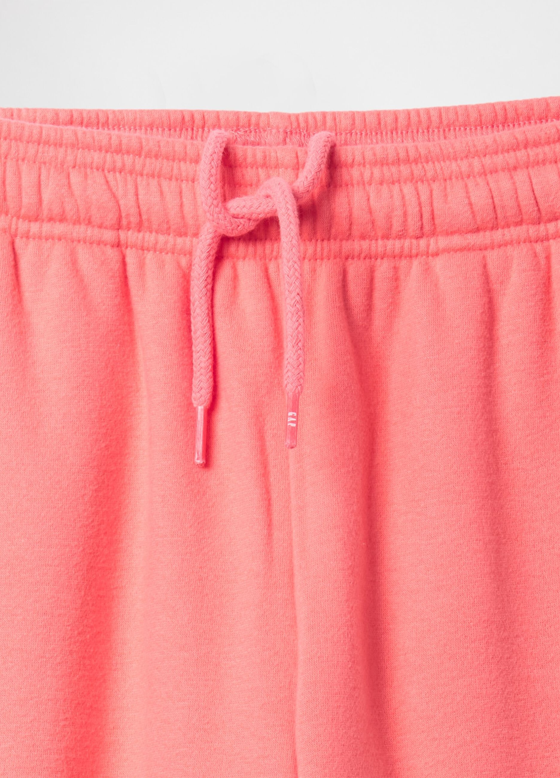 Pink joggers with elasticated edging and logo embroidery