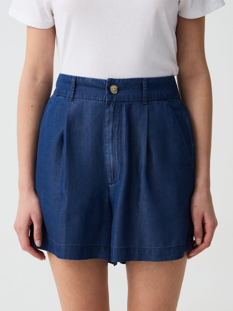 Fluid denim-effect Bermuda shorts with pleats_1