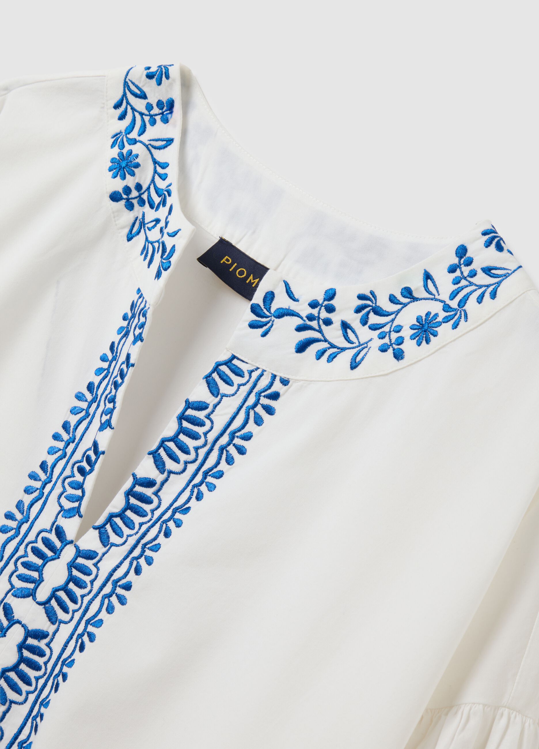 Vestito da donna in puro cotone bianco con ricami