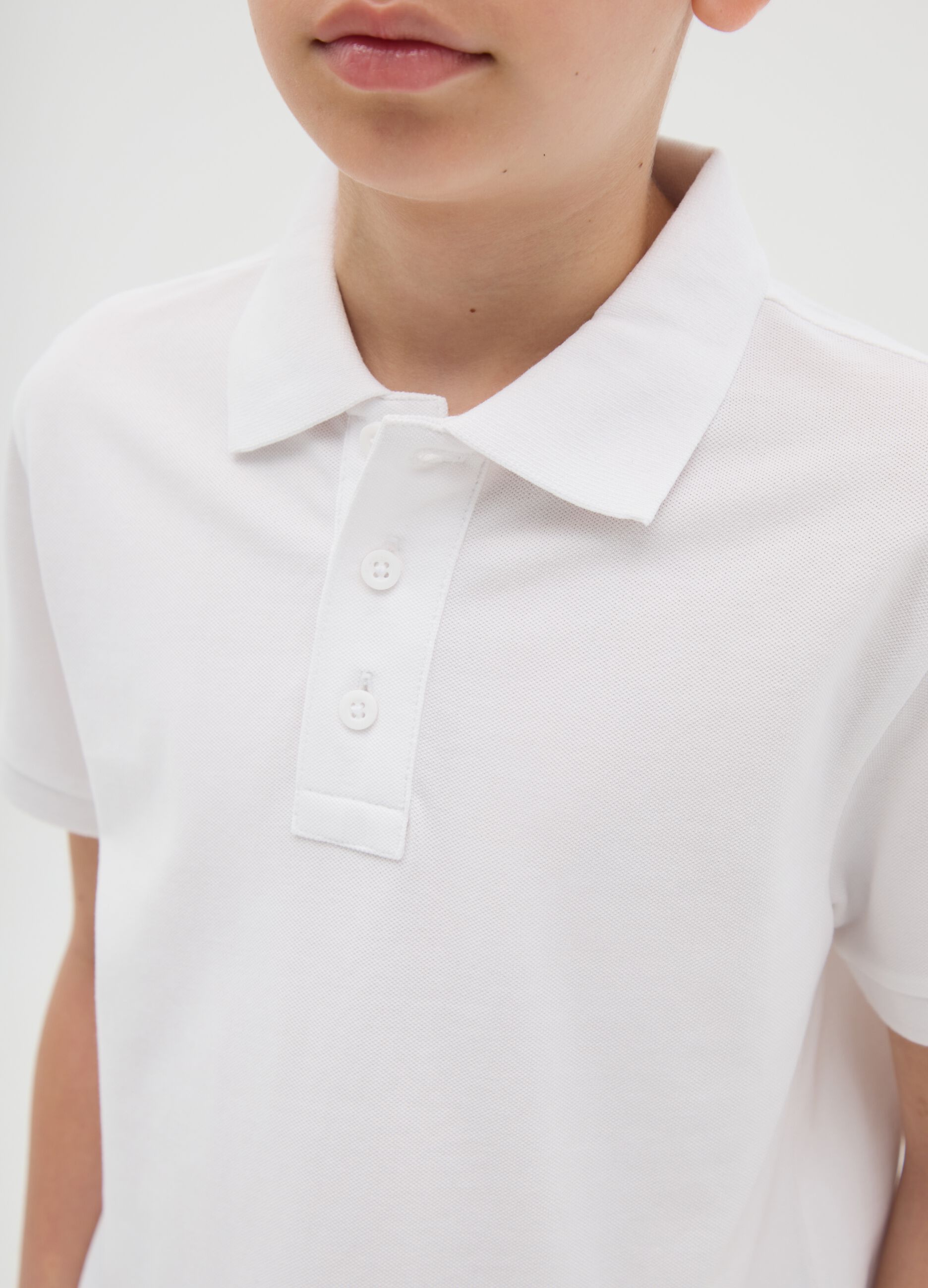 White cotton short sleeve polo