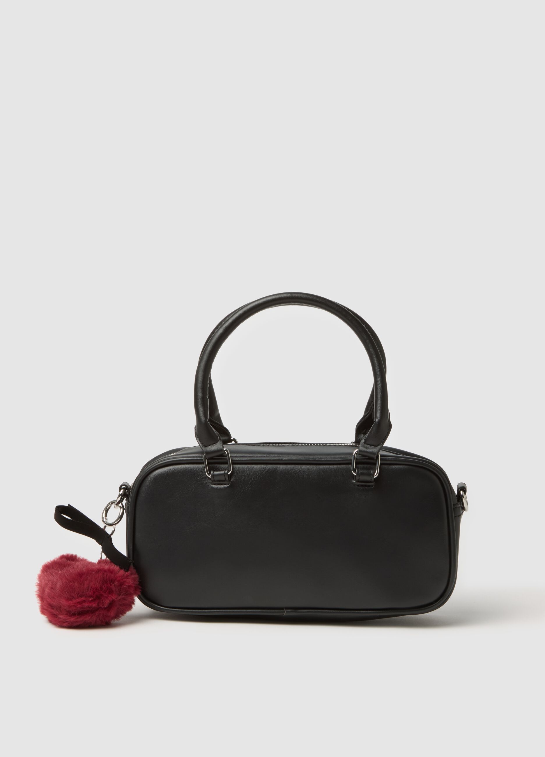Black handbag with red charm