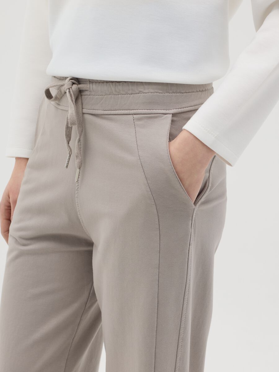Beige fluid trousers with wide leg_3