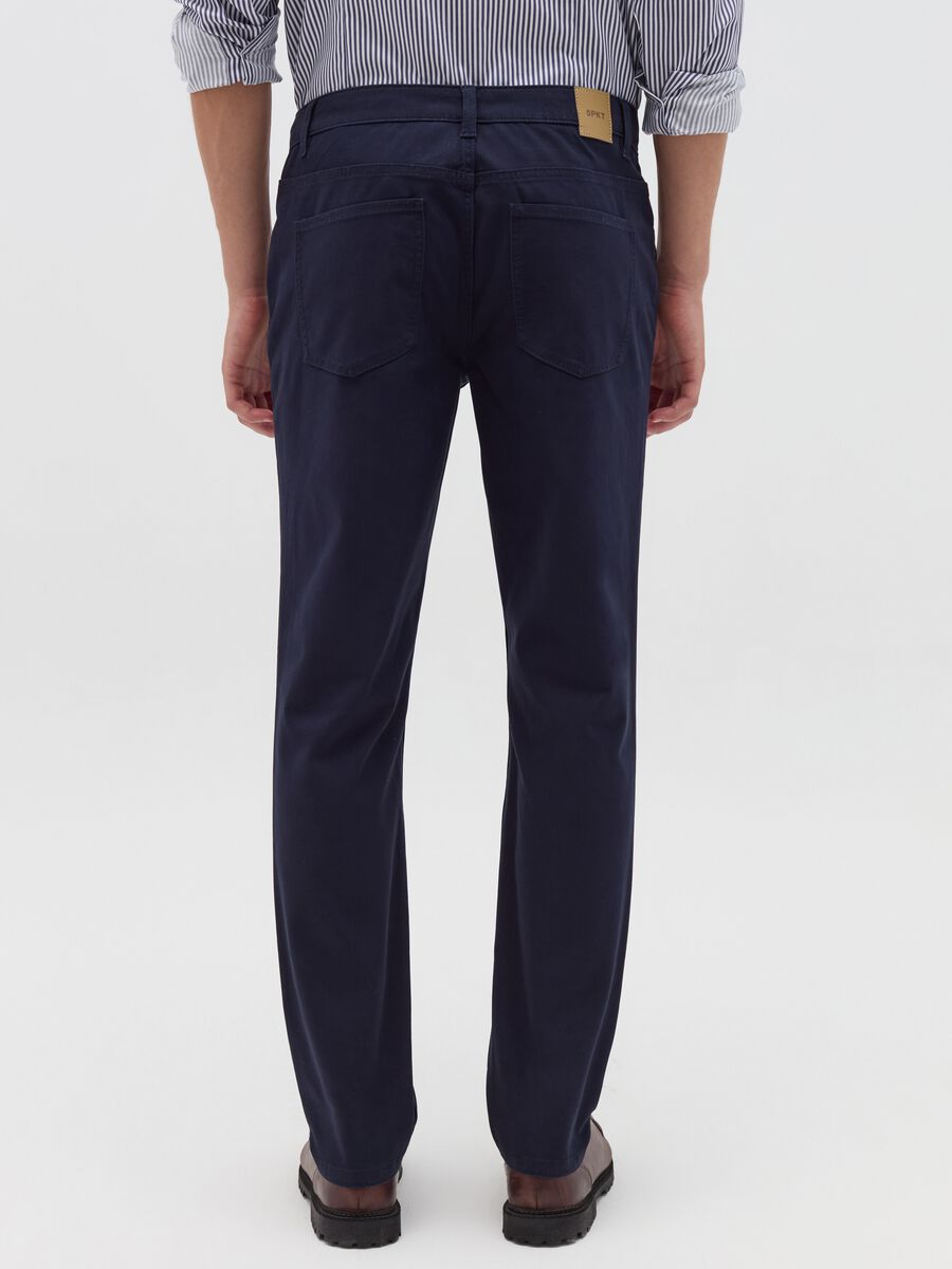 Trousers with five pockets and couture stitched weave_3