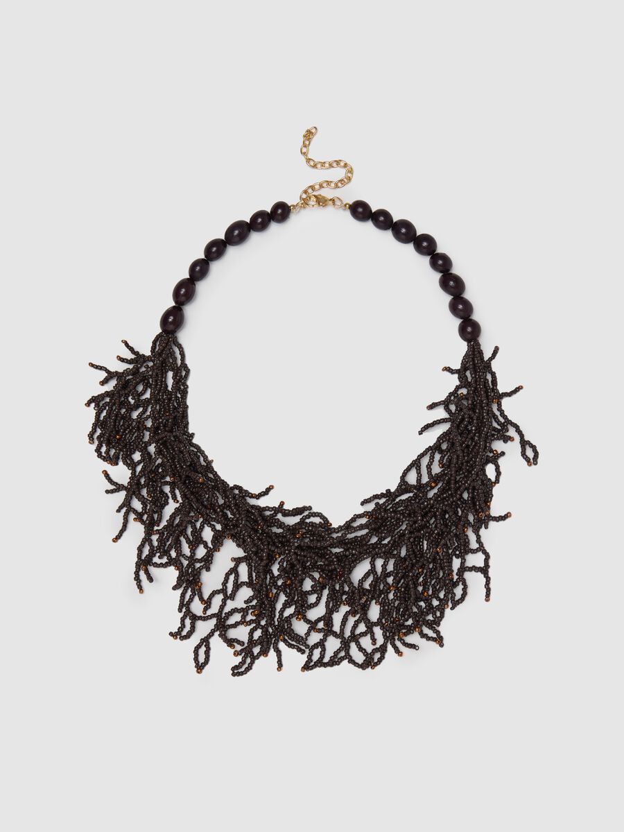 Black necklace with pearls and strands of beads_0