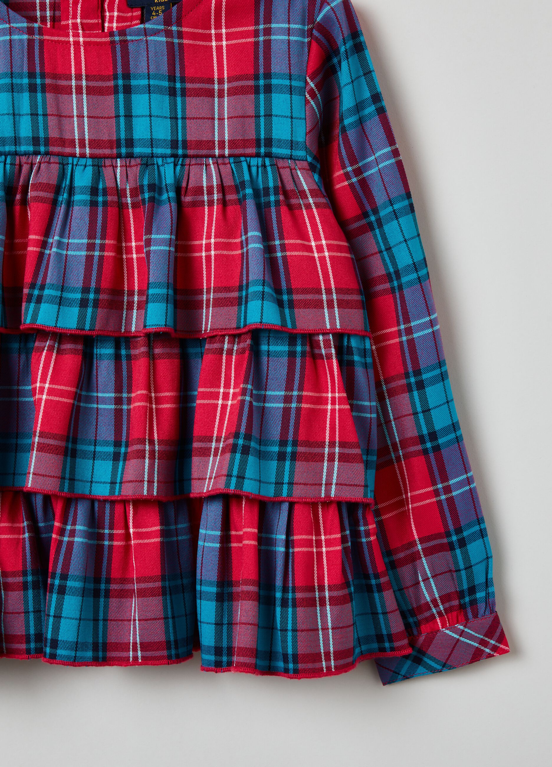 Blusa in fantasia check con balze