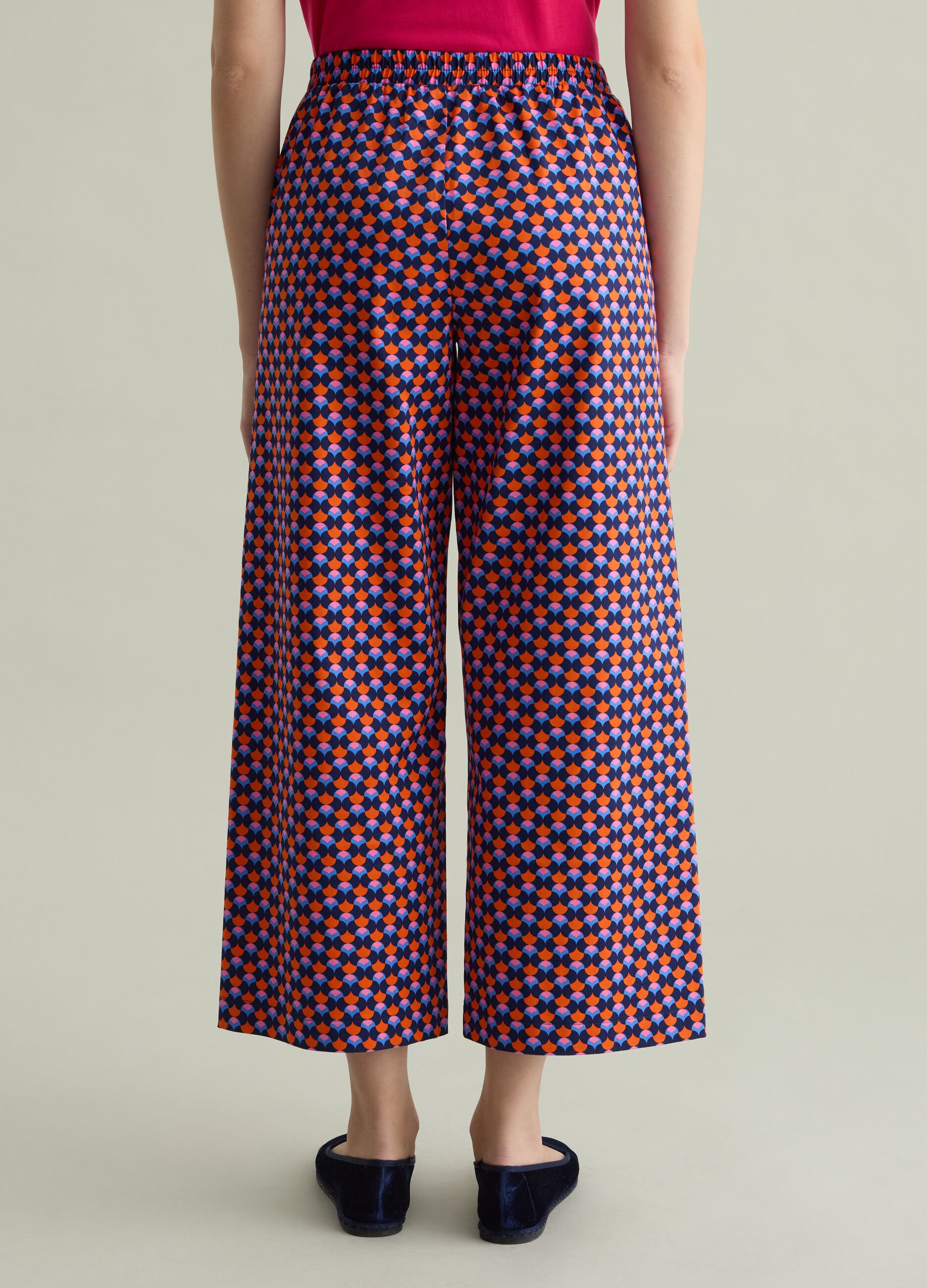Pantalone a gamba larga stampa all-over