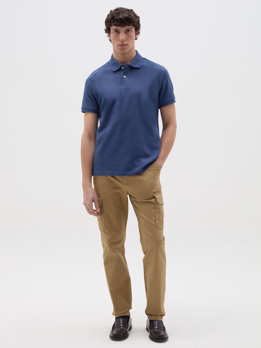 Solid colour polo shirt in organic cotton_0