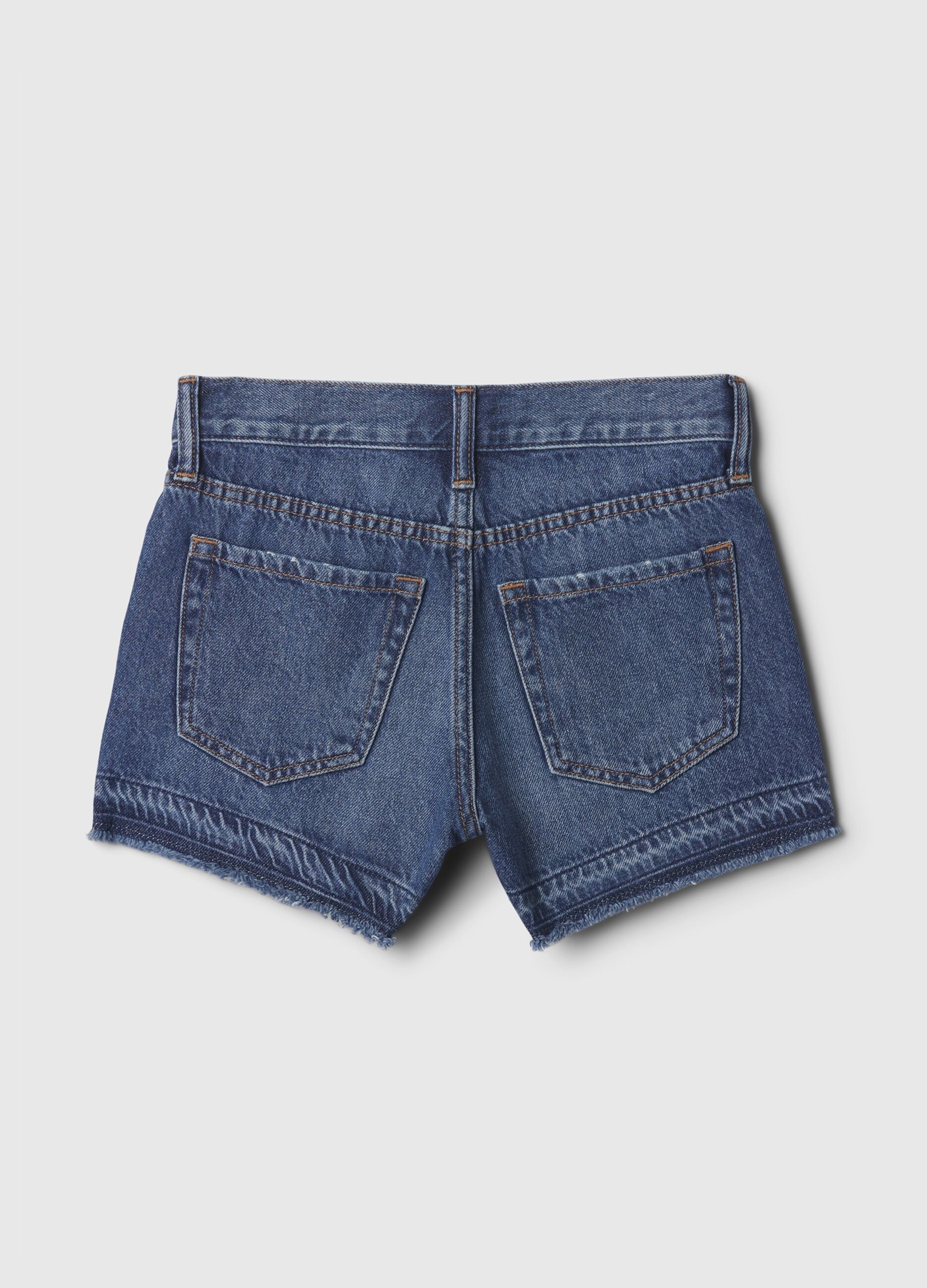 Shorts in denim con abrasioni a vita bassa