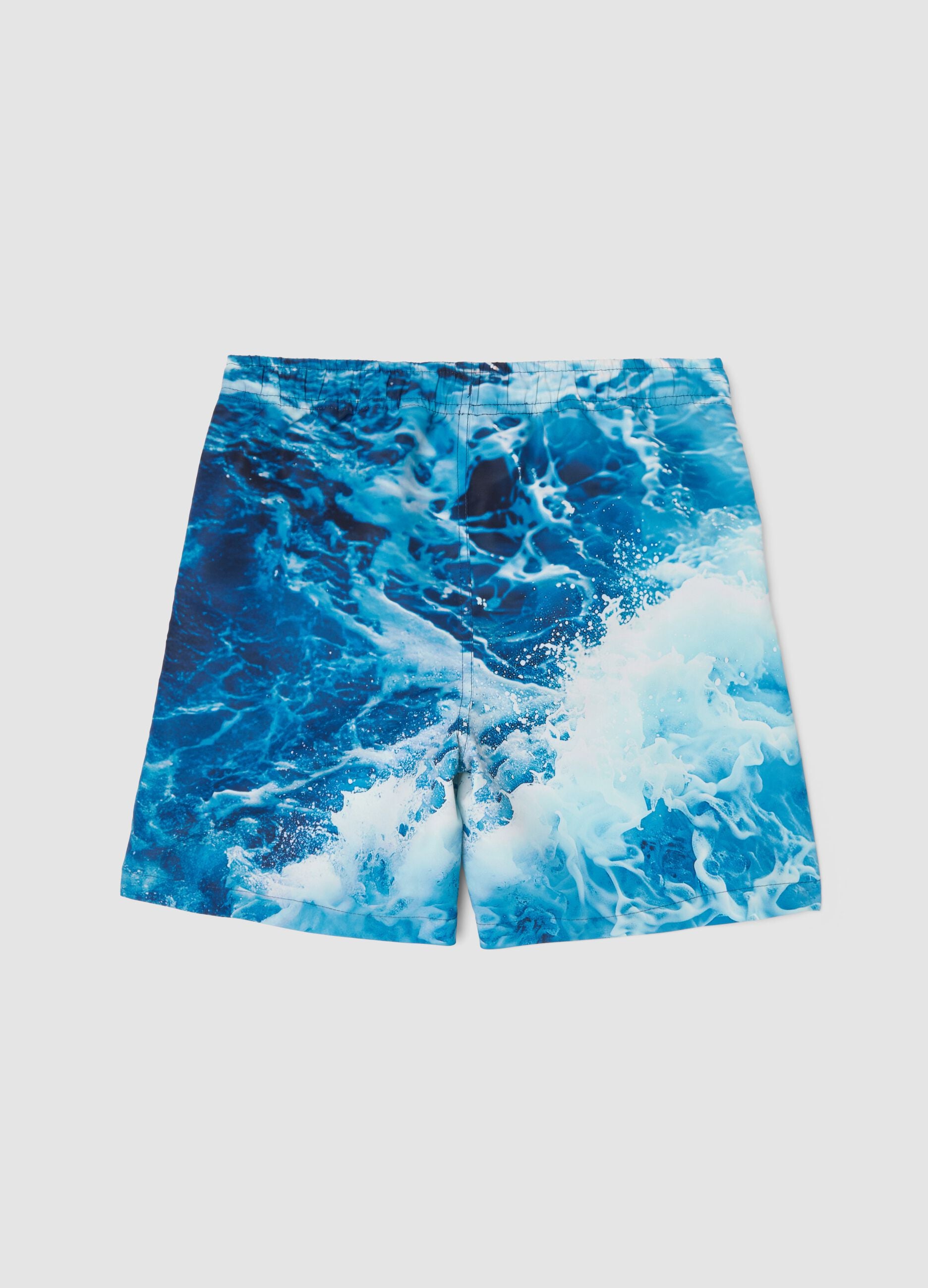 Blue boys&rsquo; swim shorts with wave and palm print