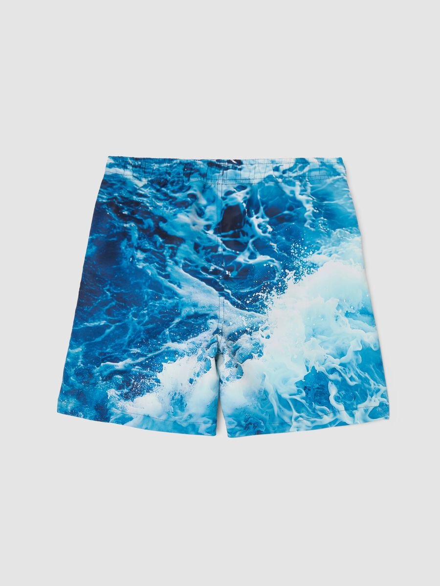 Blue boys&rsquo; swim shorts with wave and palm print_1