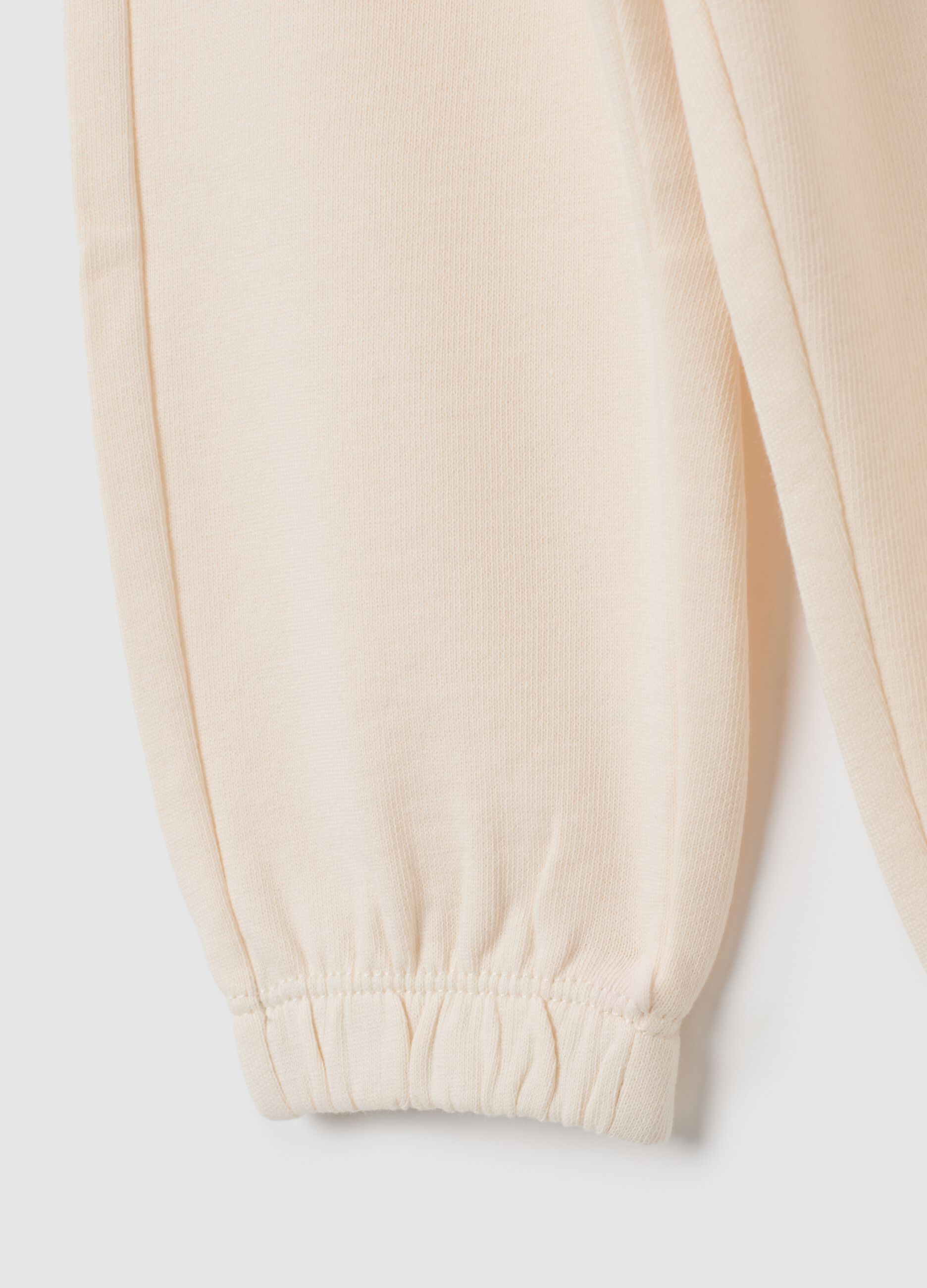 Pantaloni jogger da bambina in puro cotone beige