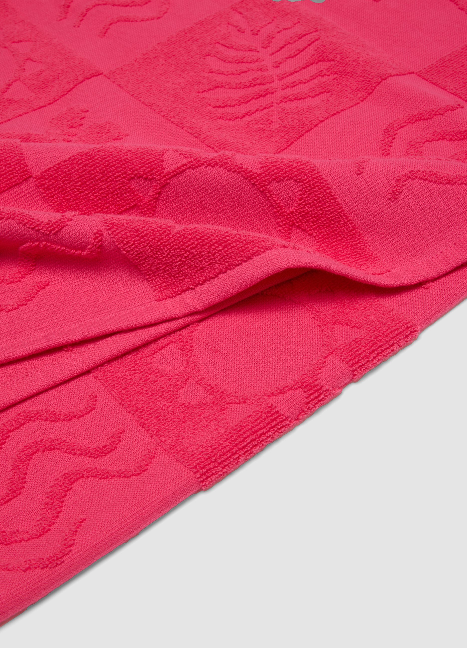 Telo mare rosa in puro cotone con motivo jacquard