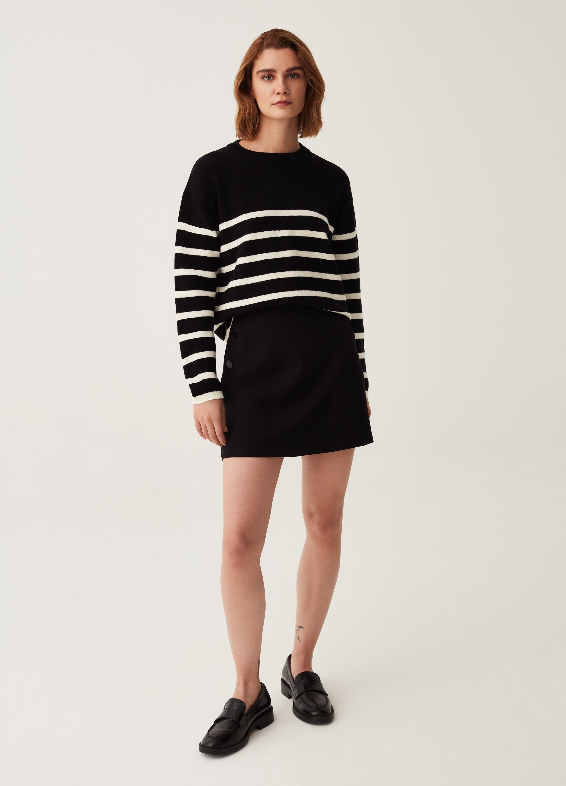 Minigonna stretch con tasche_0