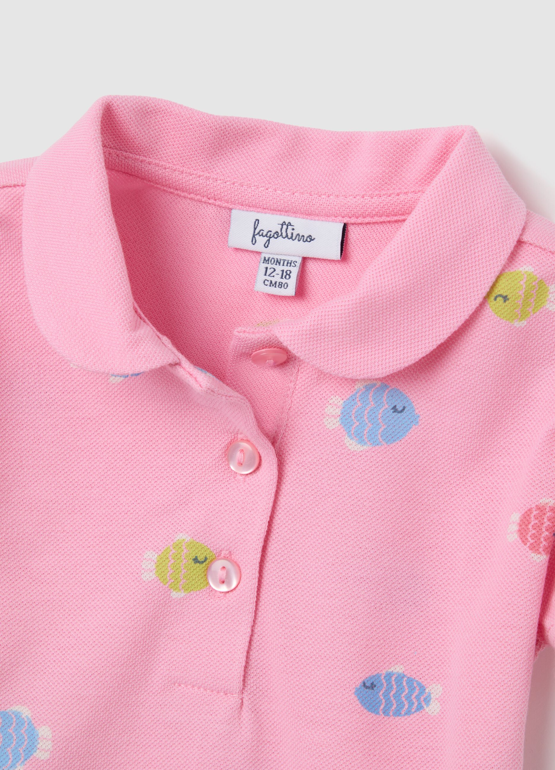 Pink polo with fish pattern in organic cotton