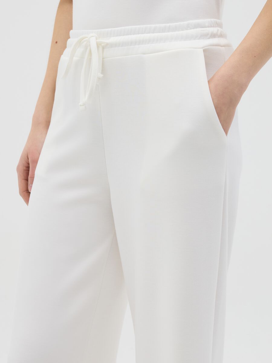 White palazzo trousers in stretch fabric_2