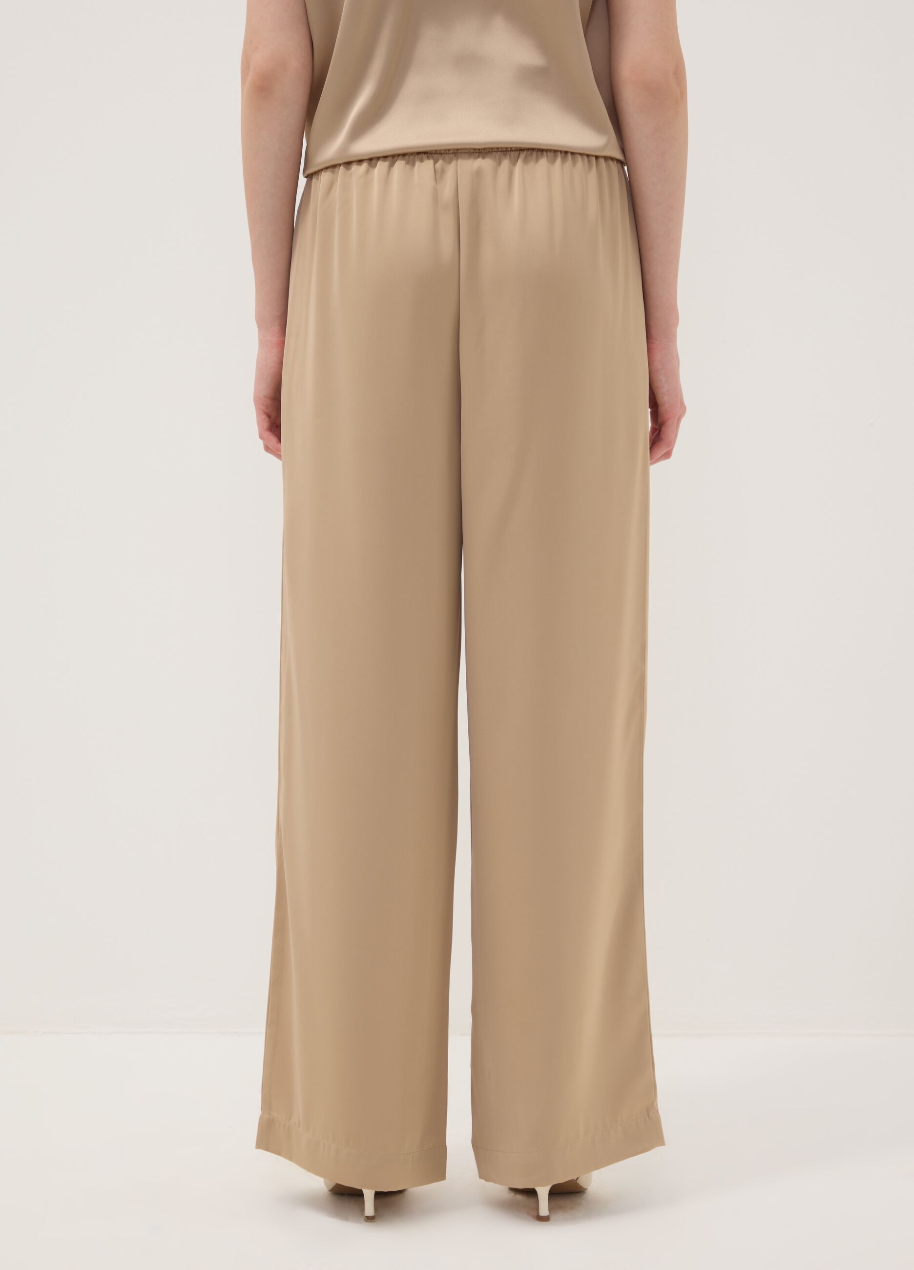 Beige wide-leg trousers with regular waist