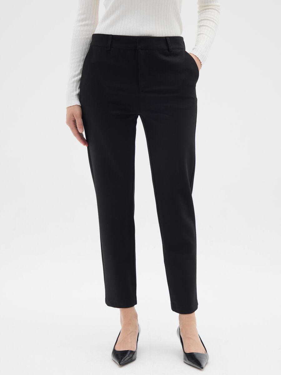 Black slim trousers in stretch fabric_1