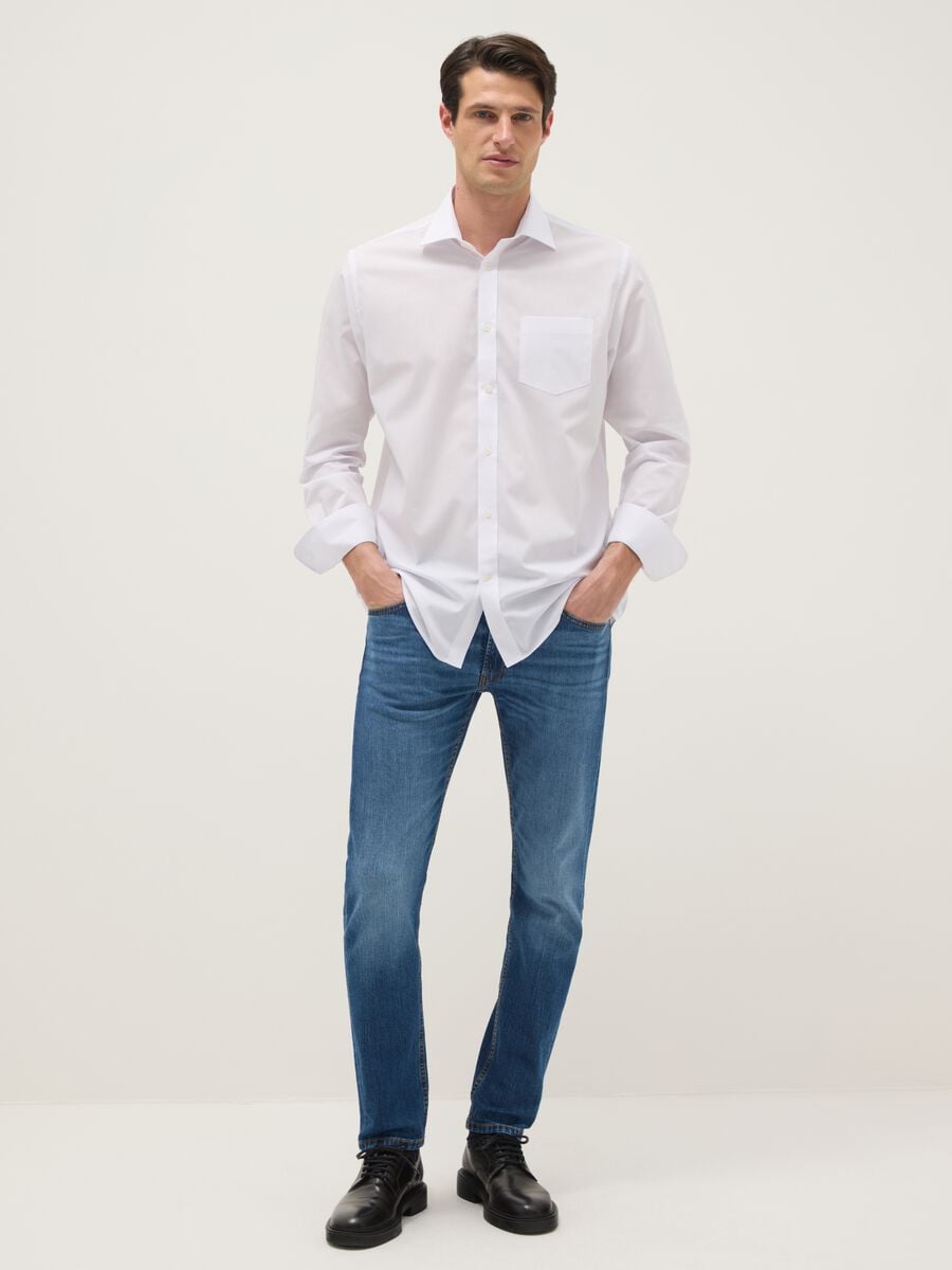 Jeans in cotone elasticizzato blu slim fit_0